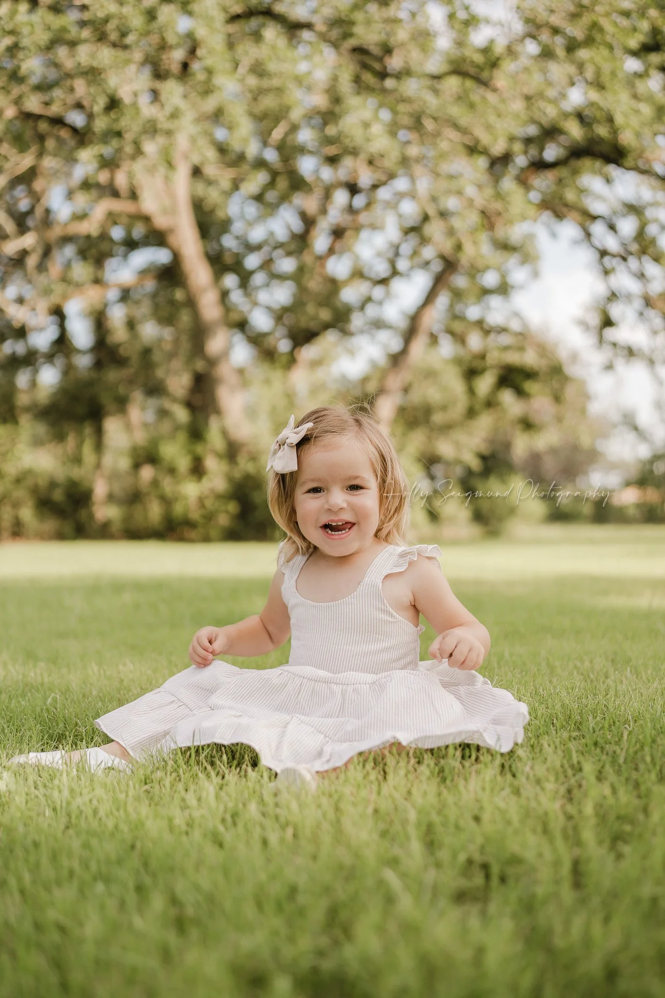 child photography session for a 3rd birthday in a spring setting in Central Texas