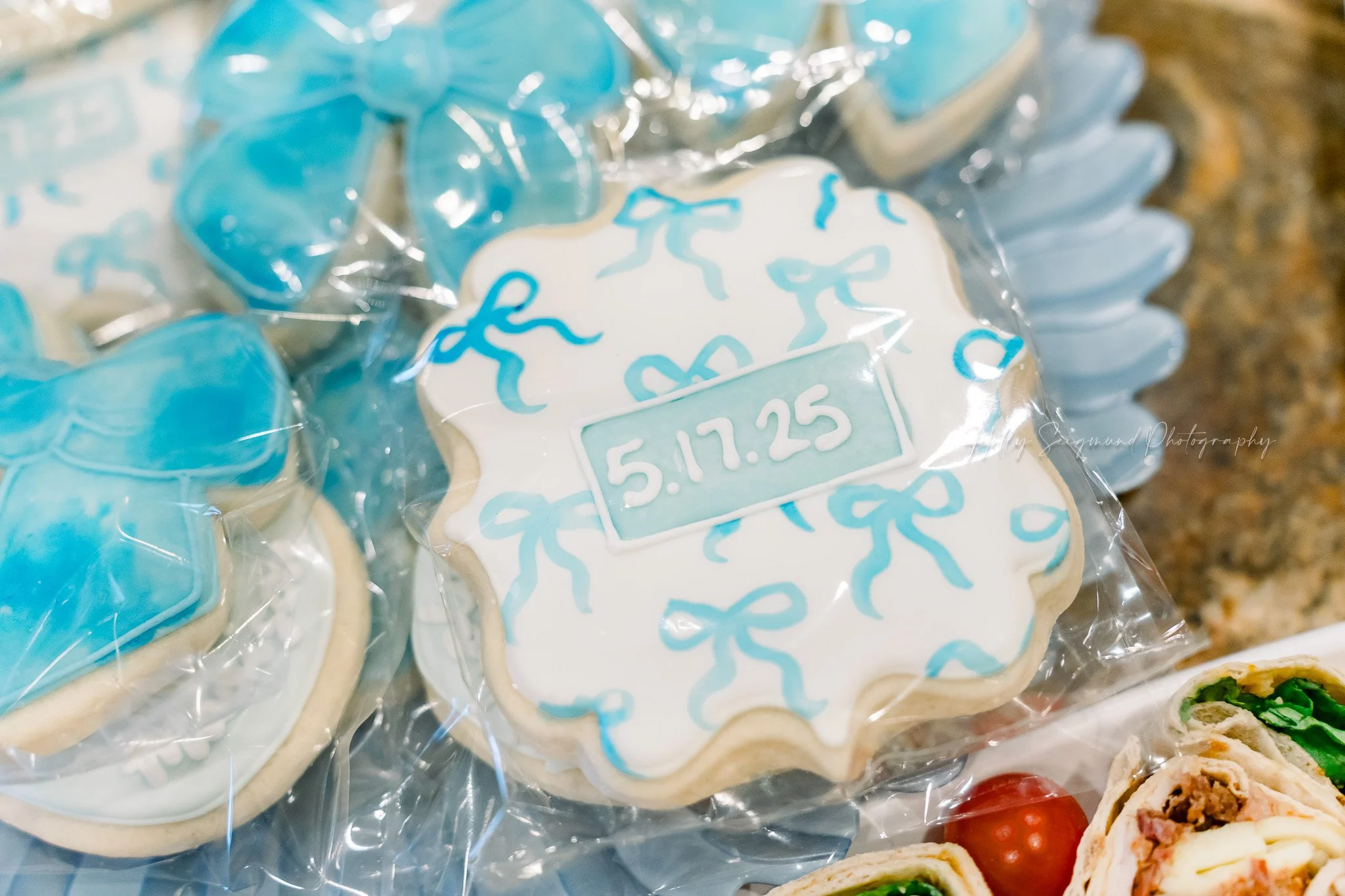 Bridal shower celebration in Central Texas with bride surrounded by friends and family