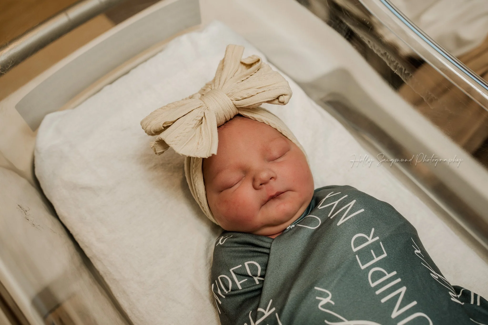 Swaddled newborn in hospital blanket at St. David’s Women’s Center of Texas