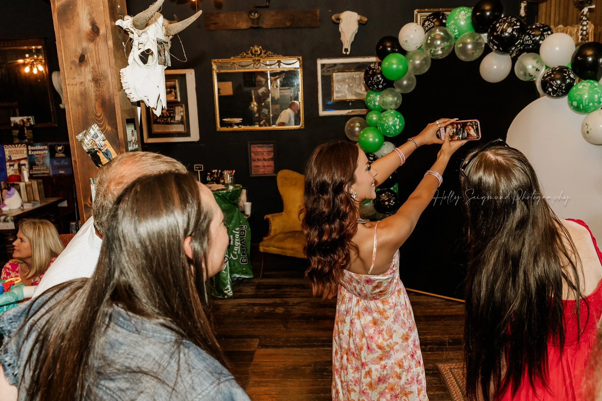 Senior party event photography in Coupland Texas with candid guest interactions