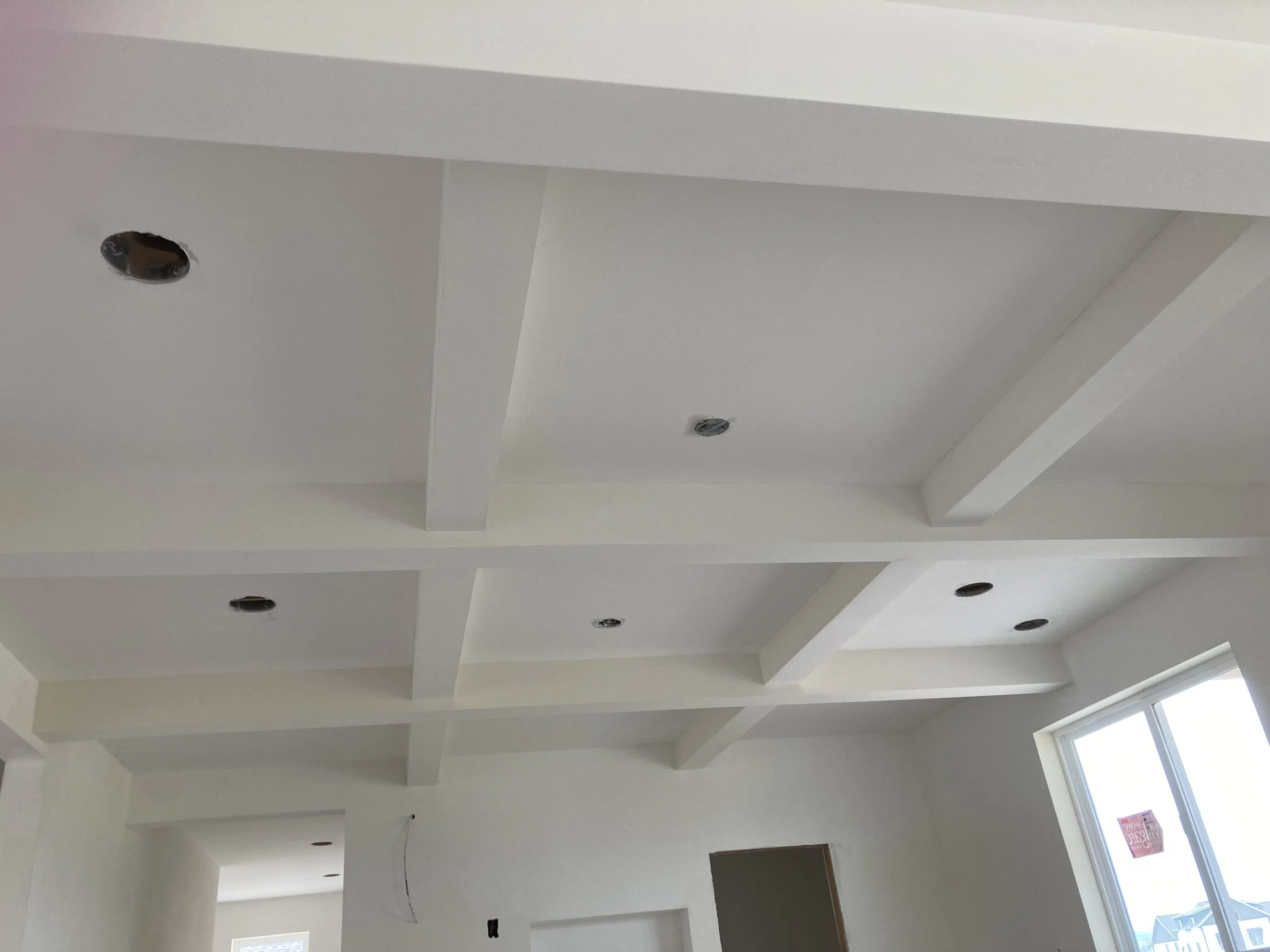 Freshly painted coffered ceiling and walls in a new Bozeman, MT home