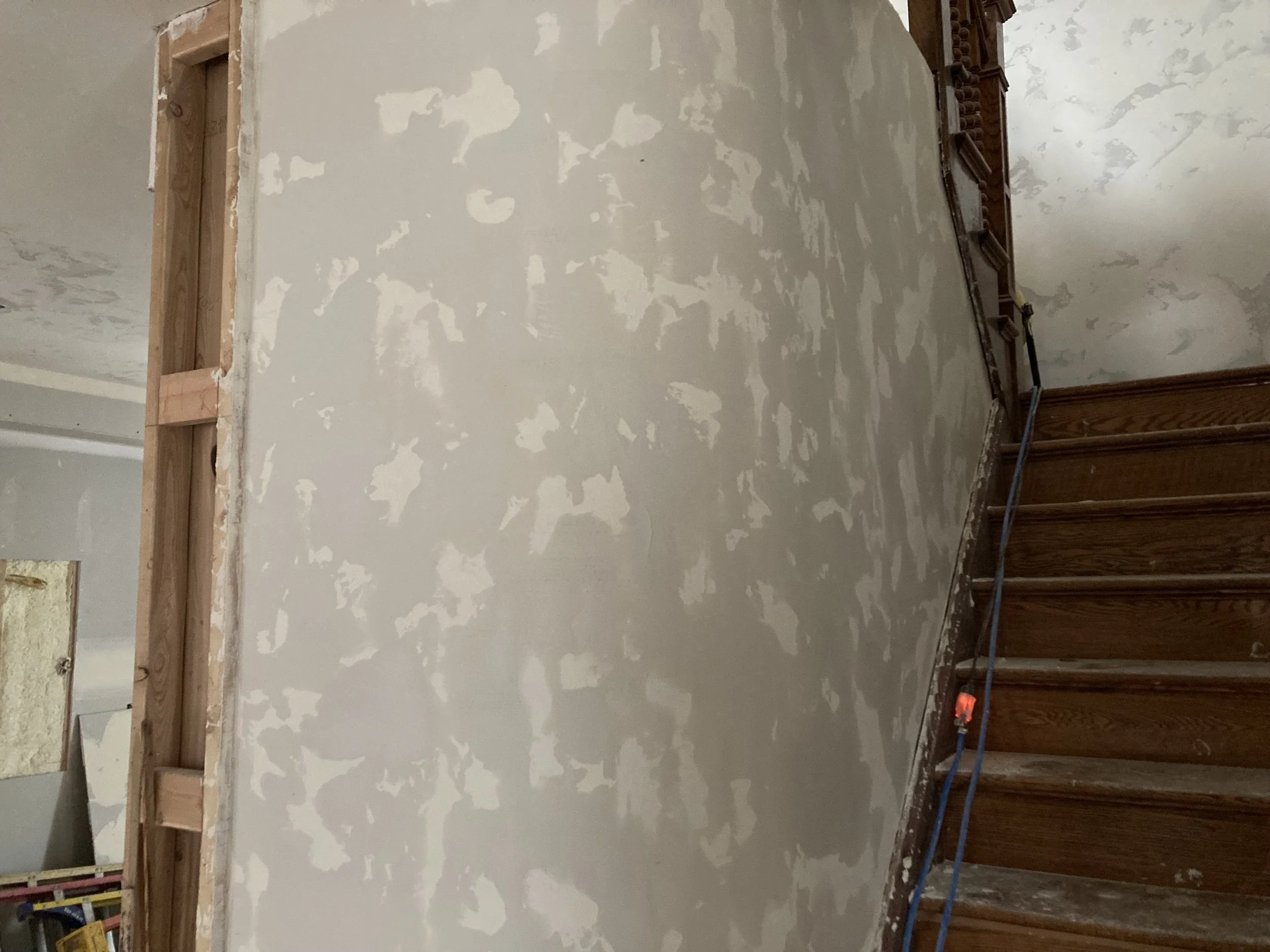 Drywall taping and mudding in progress on a new construction home in Bozeman, MT