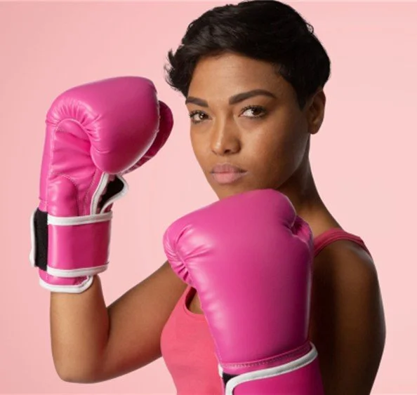 Pink awareness ribbon on a radiant pink background.