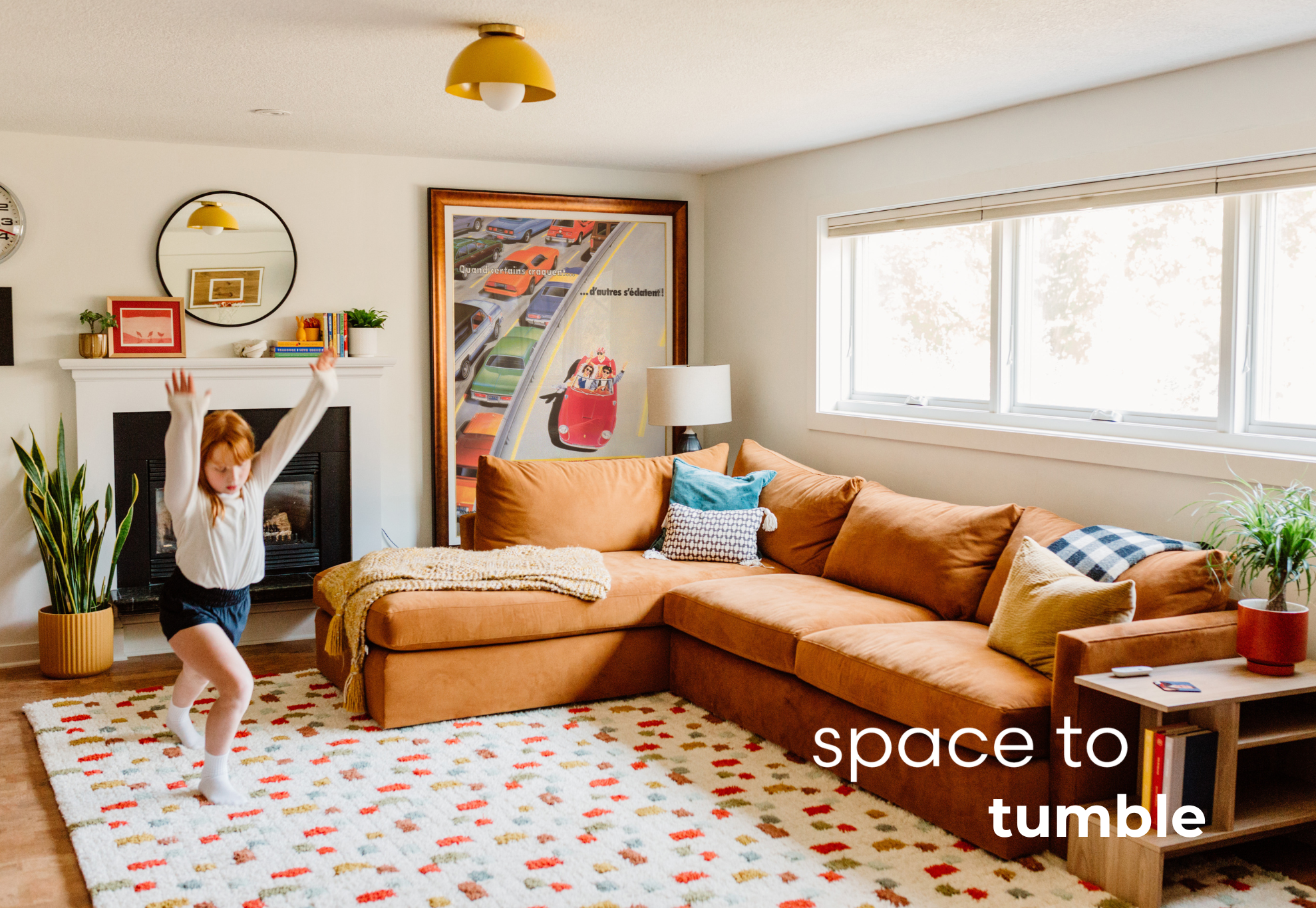 Fun and inviting basement designed for kids, with energetic colors, and comfortable spots for family time.