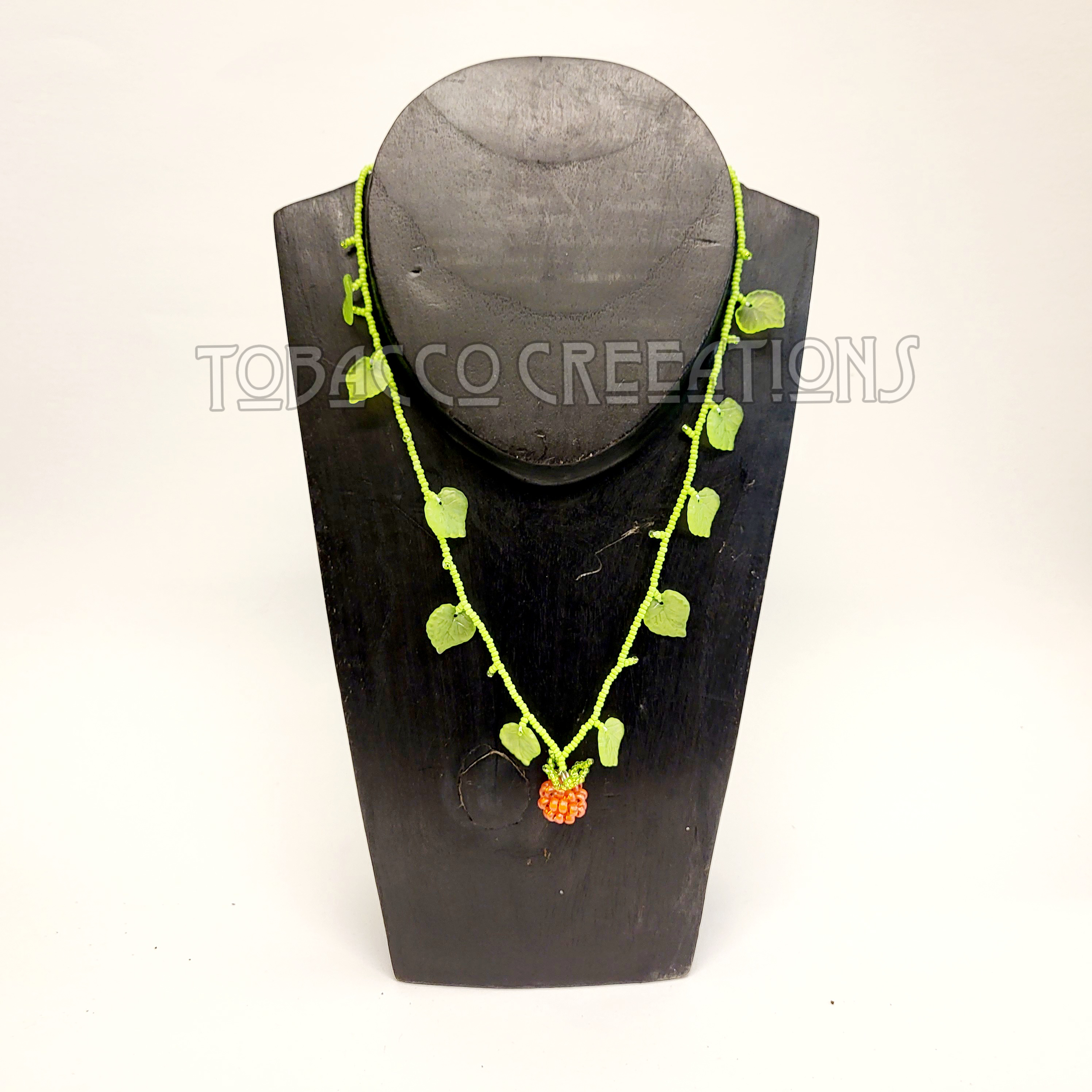 Salmon Berry necklace.png