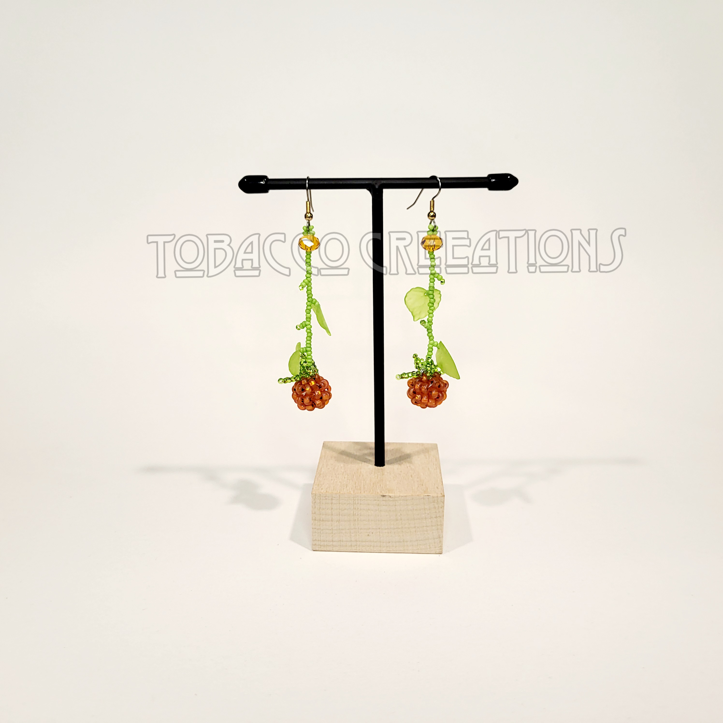 Salmon berry earrings small.png