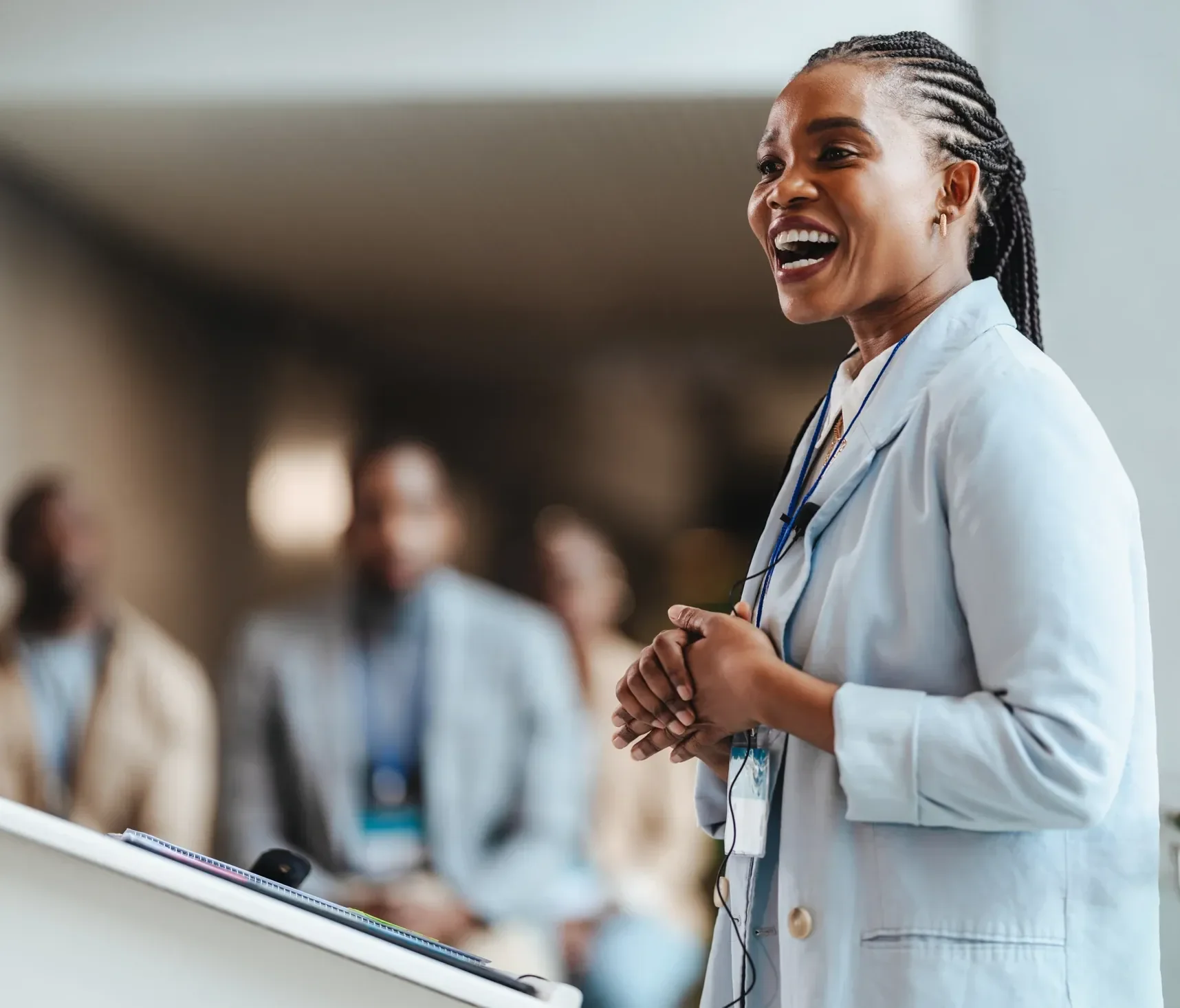 A speaker addressing a conference audience