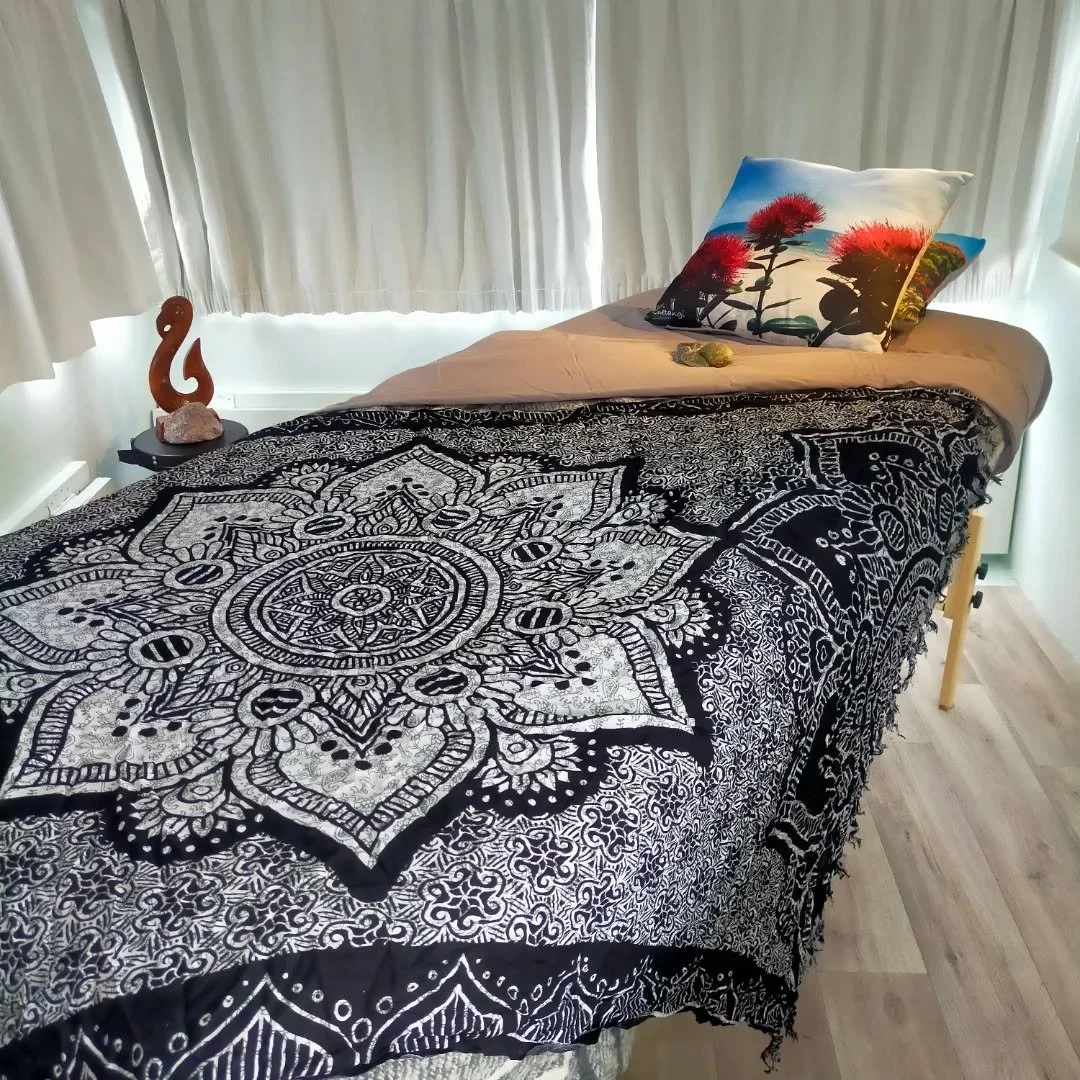 Healing space prepared for massage and energy therapy sessions creating a calm and nurturing environment.