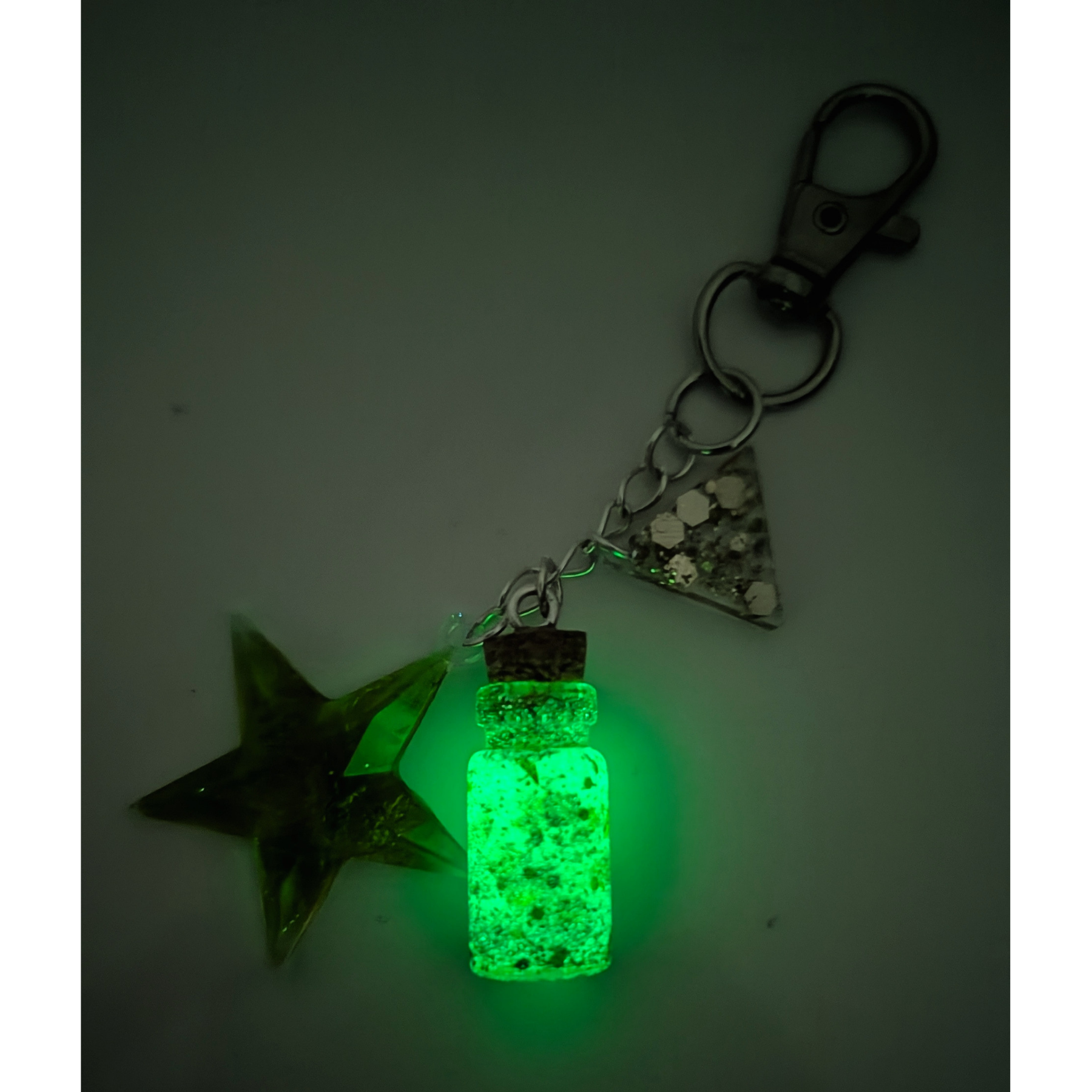 A tiny charm filled with bottled luck, glowing starlight, and a little bit of woodland magic. ✨ Verdant Wish combines shimmering emerald glitter, a luminous glow-in-the-dark potion bottle, and a t.png