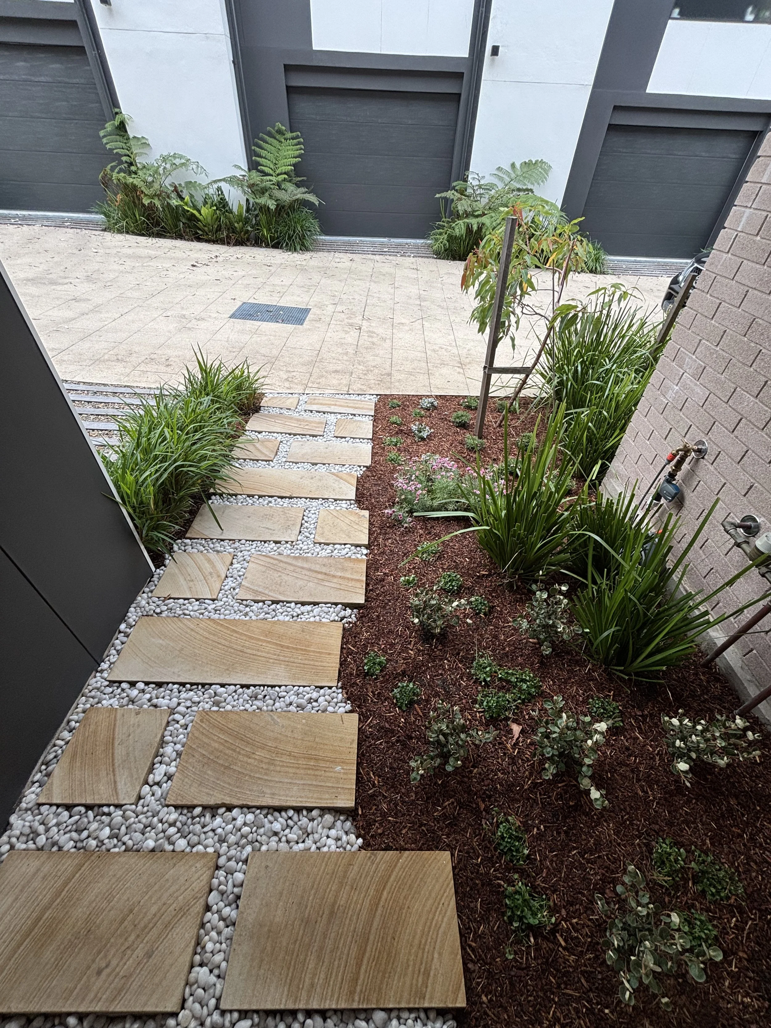 willoughby-path-to-courtyard-after-oct2025.jpg