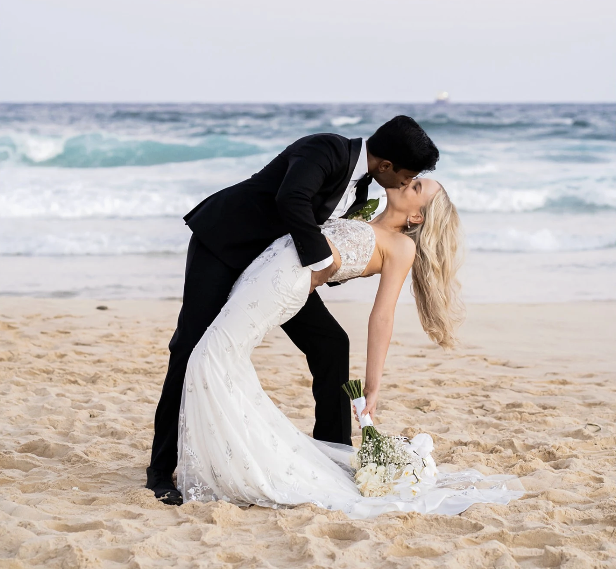 Bride and Groom Kissing on Newcastle beach