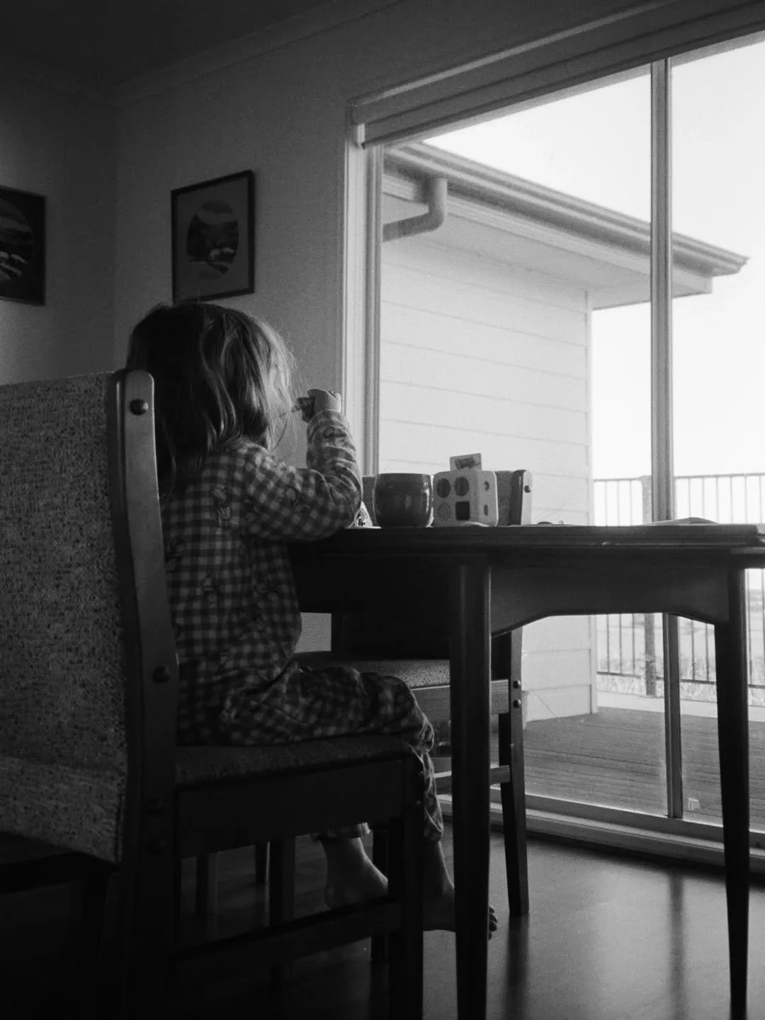 breakfast, her favourite spot at the table

-

on my trusty canon point and shoot 
develop &amp; scan by @ikigaifilmlab