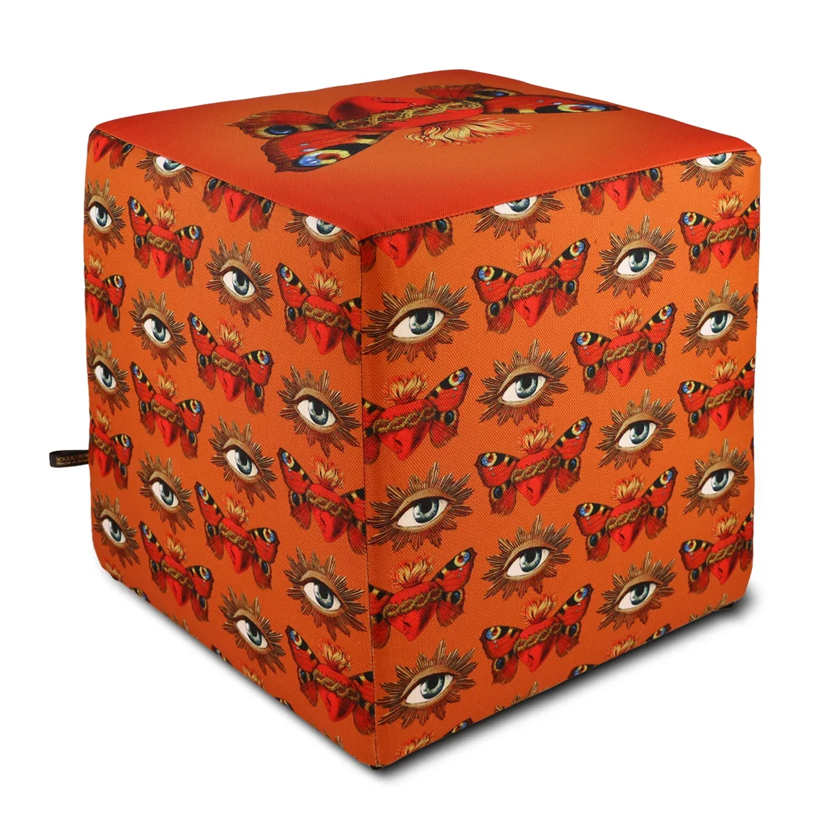kubformad sittpall i orange tyg med fjärilar och ögon motiv