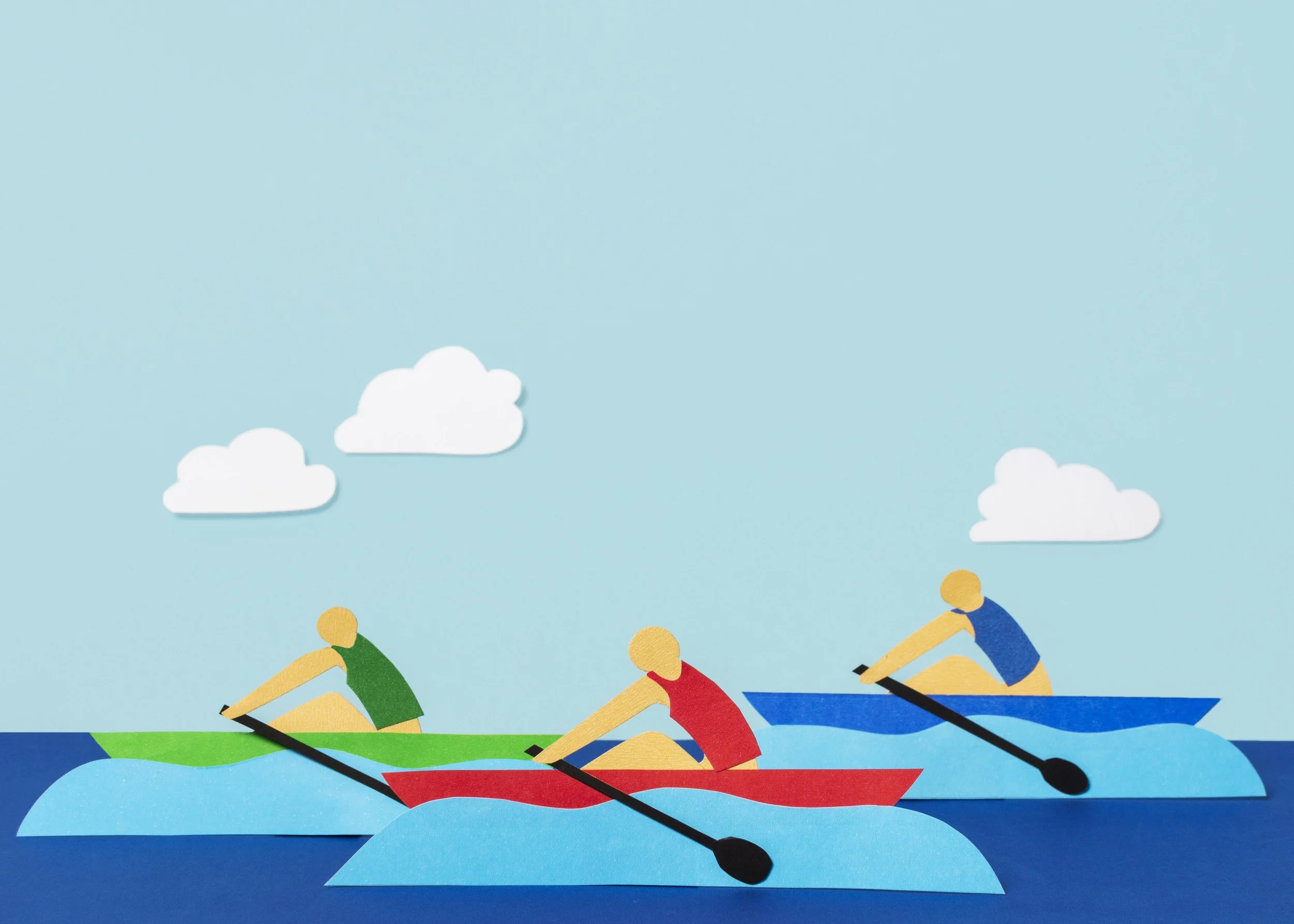 Paper cutout illustration of three people rowing boats on water with a blue sky and white clouds in the background.
