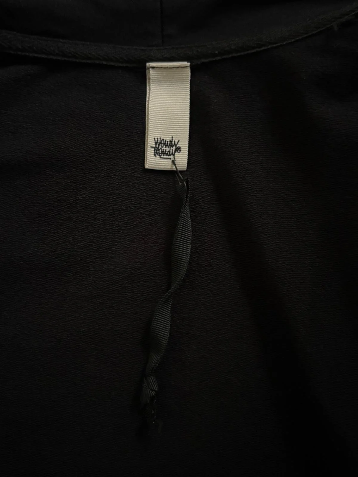 Wendy Trendy logo detail on black kimono cardigan