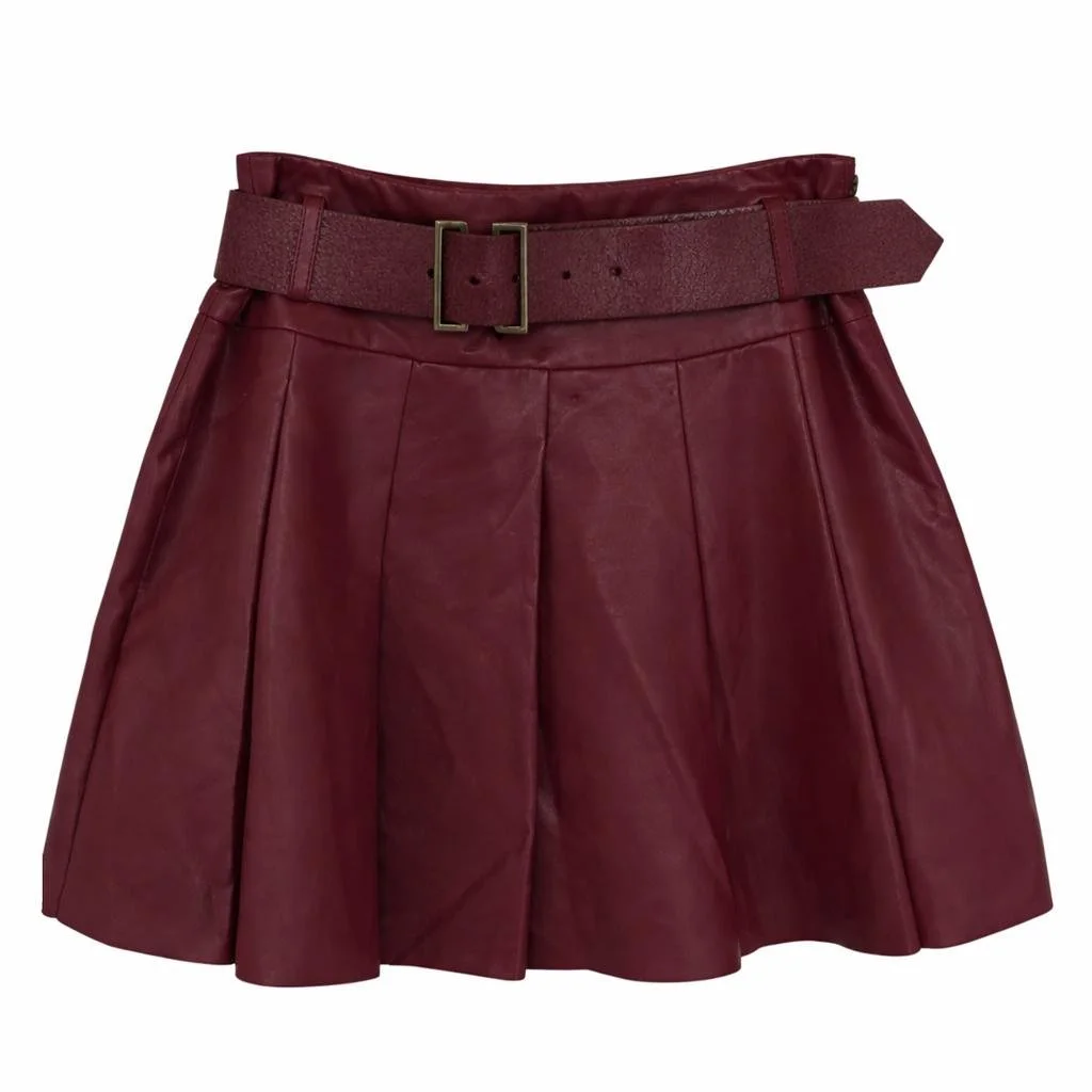 Burgundy leather mini skirt by Nikkie with pleated design and matching belt on a white background.
