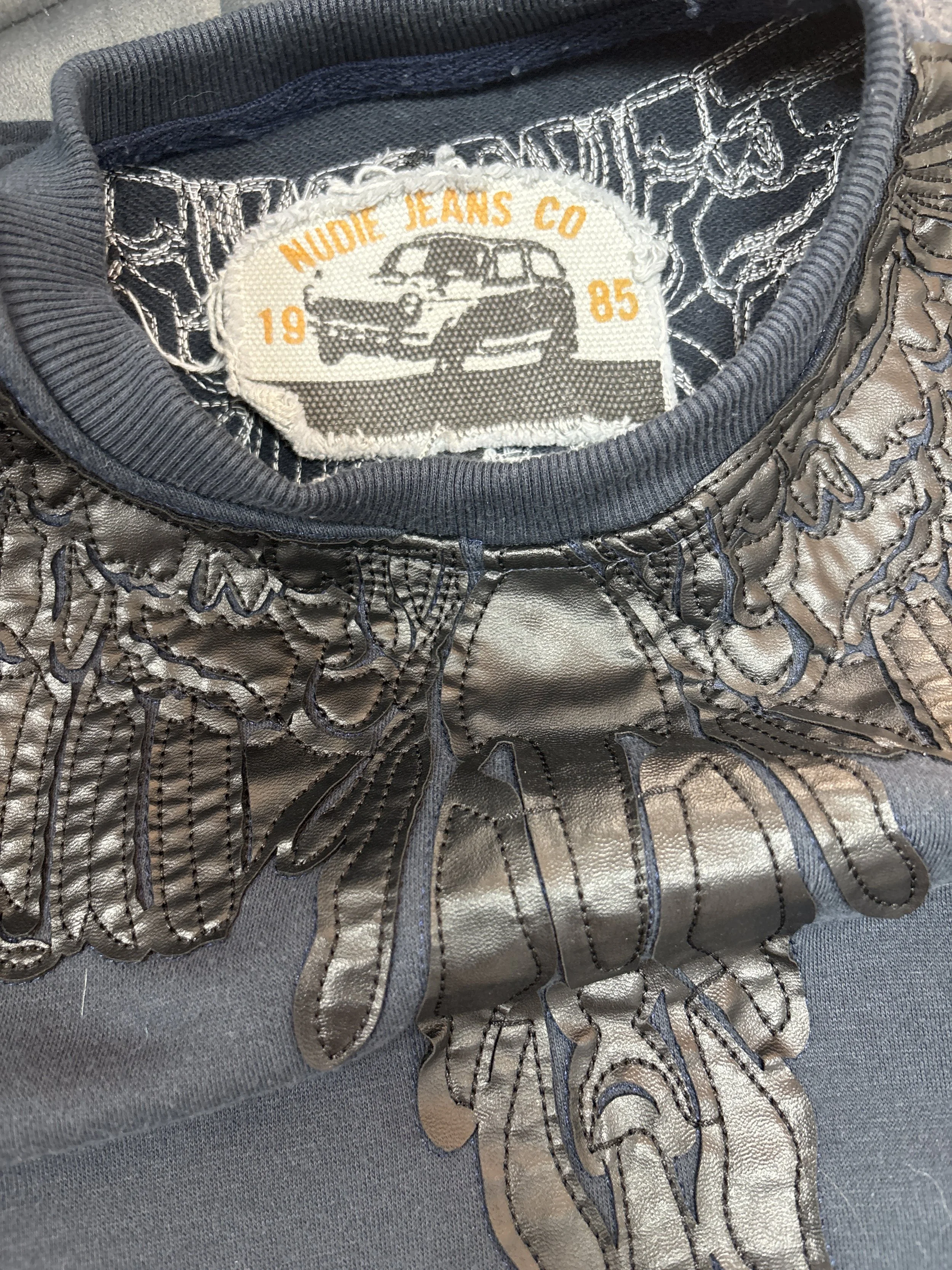 Nudie Jeans Co designer neck label detail