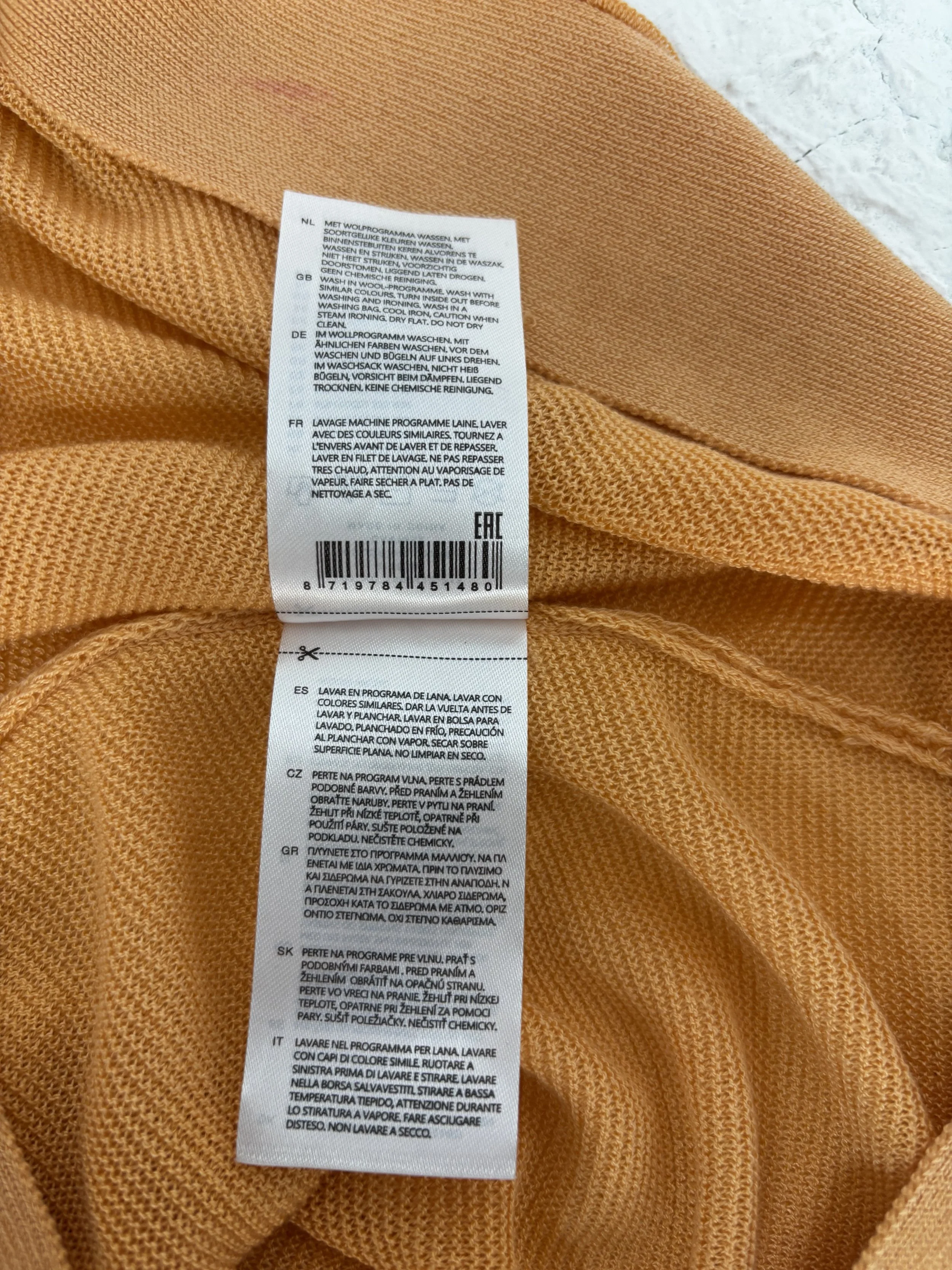 YAYA orange lyocell silk knit top care label detail
