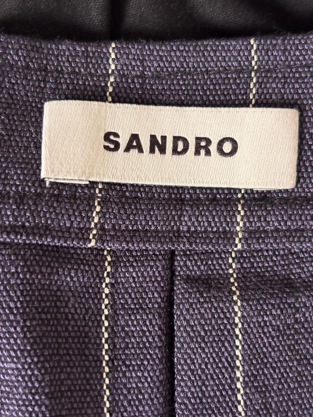 Sandro Paris label on pinstripe skirt, authentic pre-owned fashion