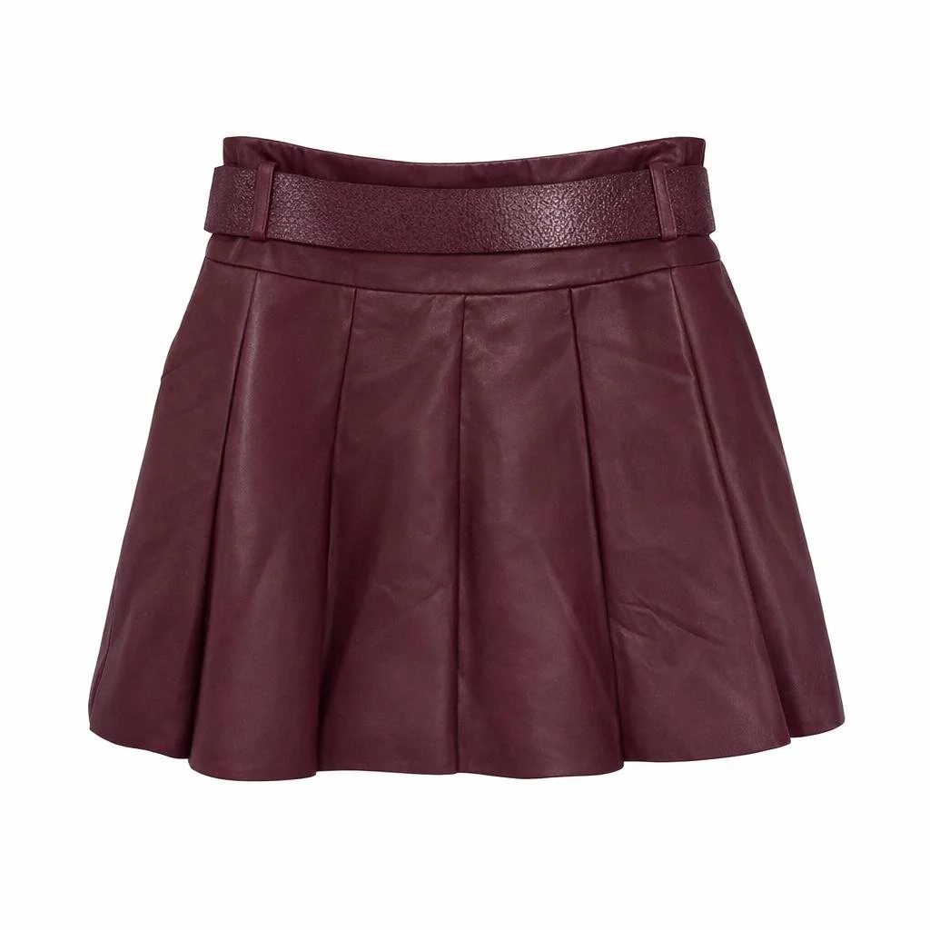 Burgundy leather mini skirt by Nikkie with pleated design and matching belt on a white background.