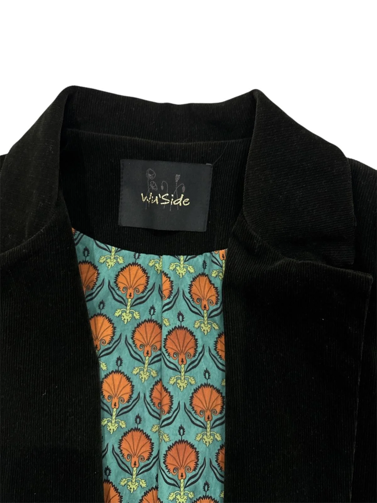 Wu’side black velvet blazer with green floral lining detail