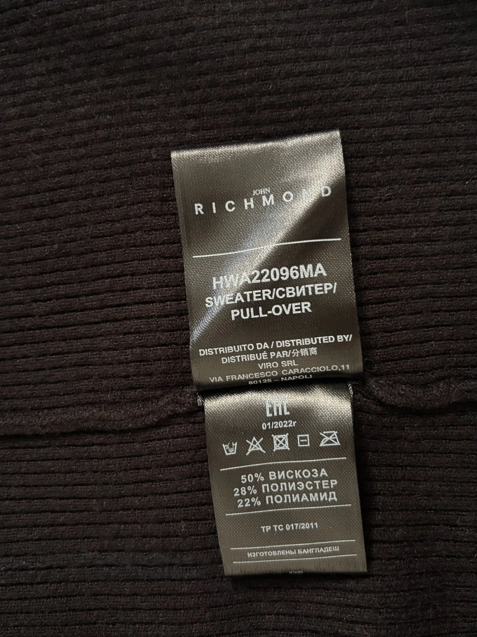 John Richmond black designer turtleneck knit close-up label detail