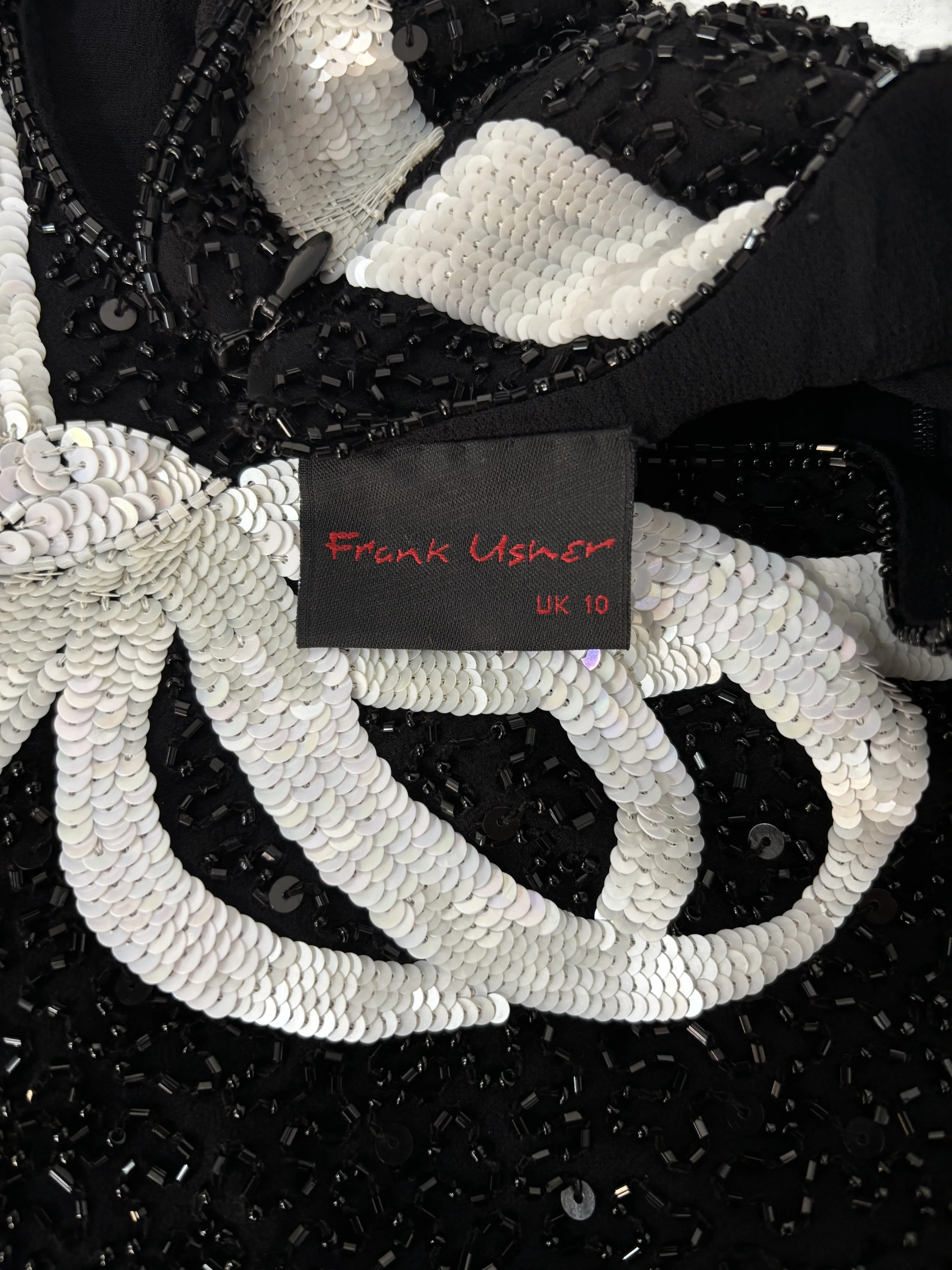 Frank Usher UK 10 label with black and white sequin embellishment