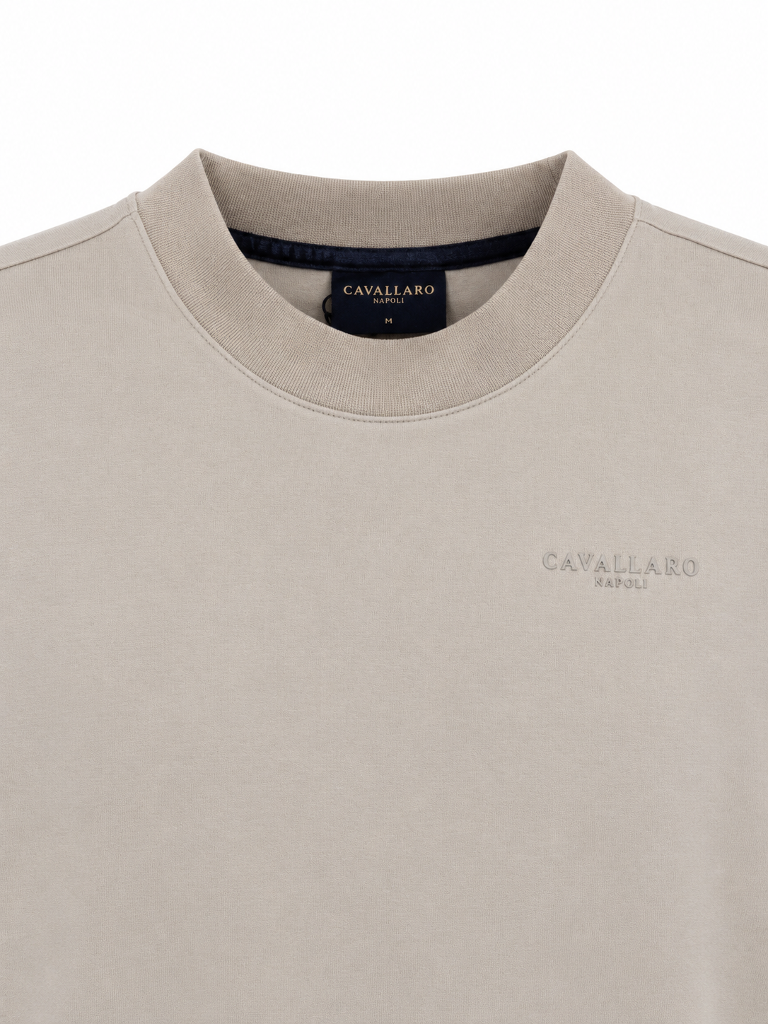 Detailed view of Cavallaro Napoli men’s luxury sweatshirt showcasing crew neck construction, embroidered logo and refined cream beige finis