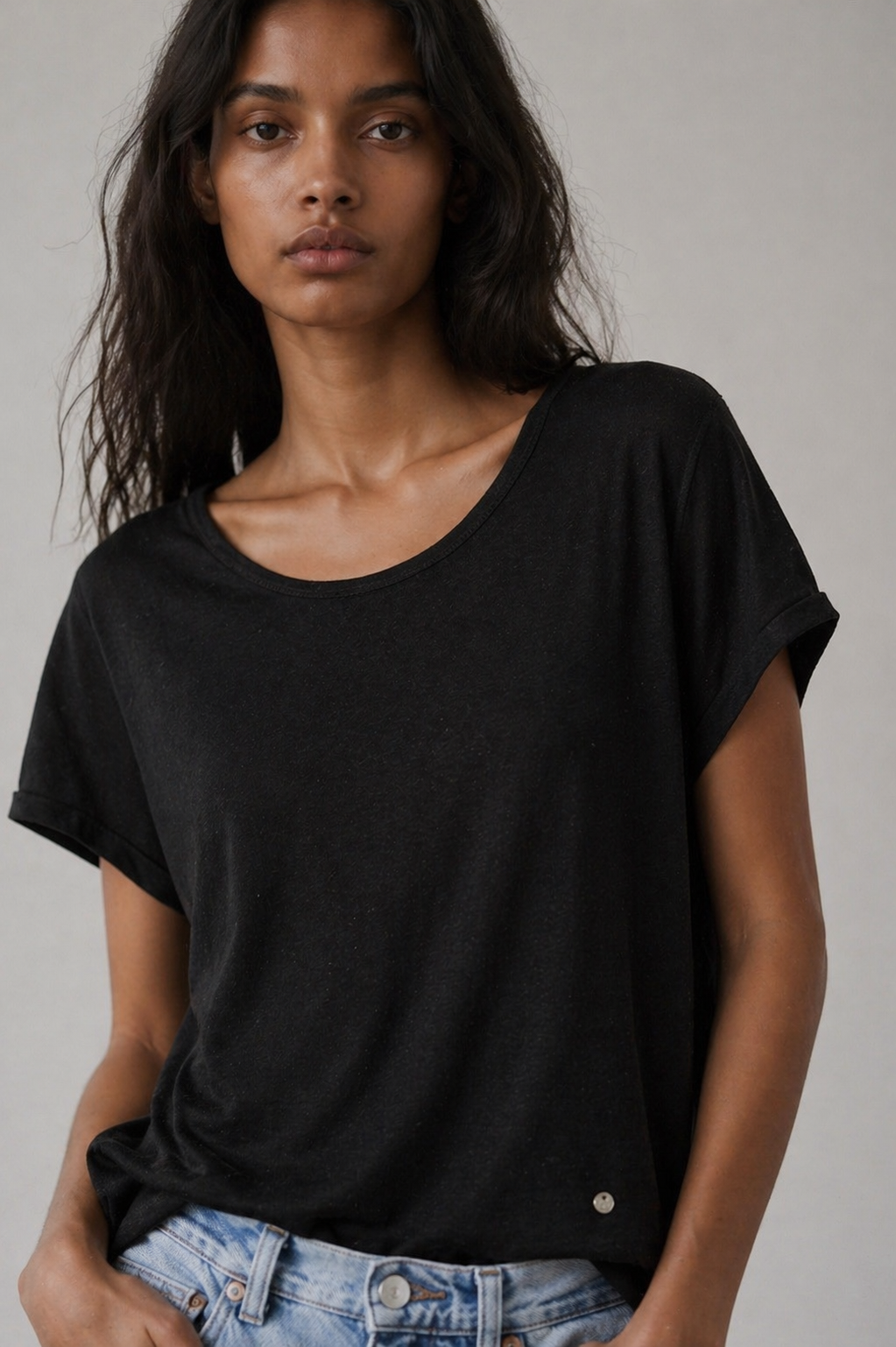Close-up of MOS MOSH black women’s t-shirt with relaxed neckline