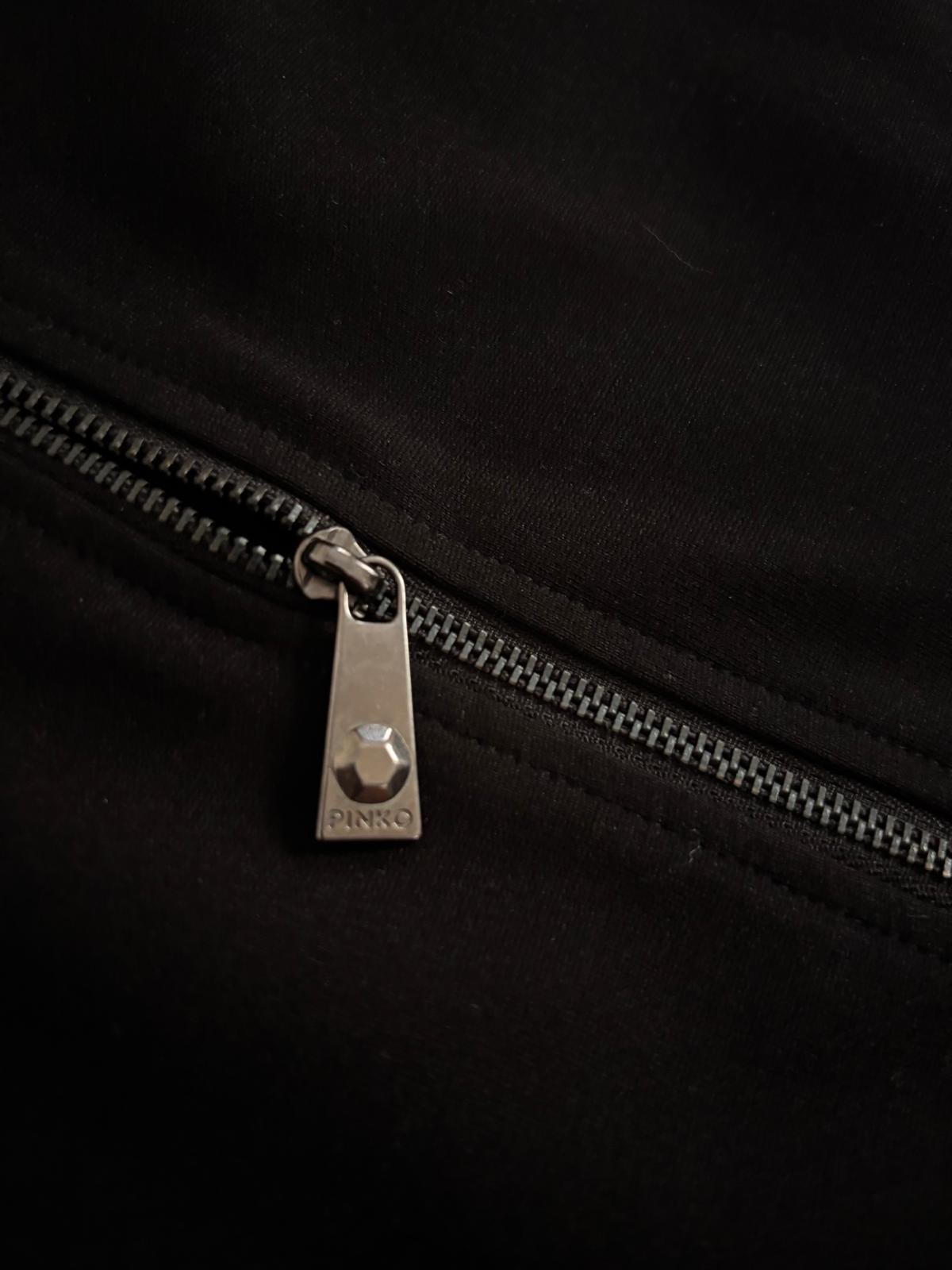 Pinko silver metal zipper detail on black designer dress, high quality hardware close-up