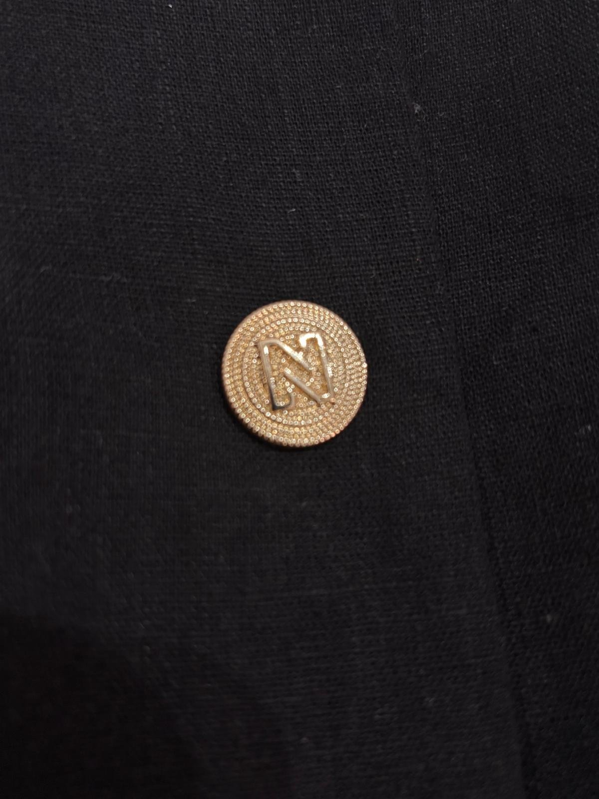 NIKKIE gold logo button detail on black viscose linen blend playsuit