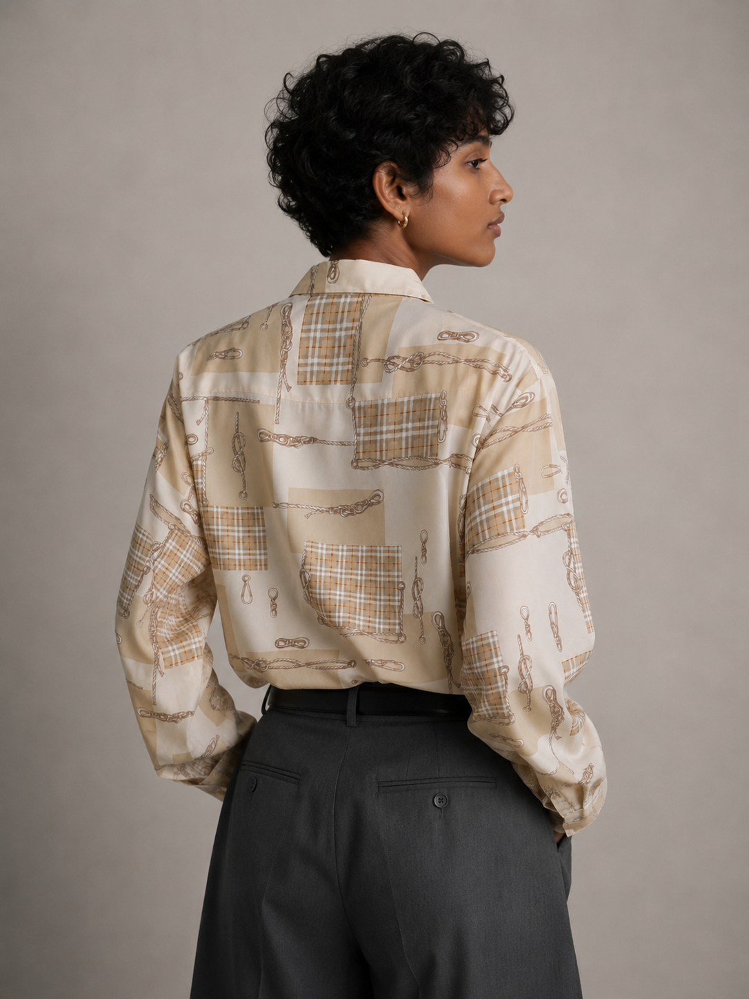 Burberrys luxury vintage blouse close-up with heritage check pattern