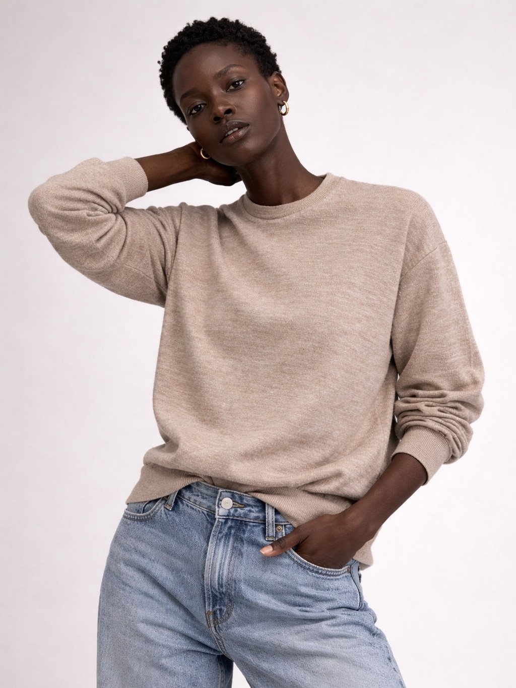 Close-up of soft beige virgin wool knit texture on FAY sweater