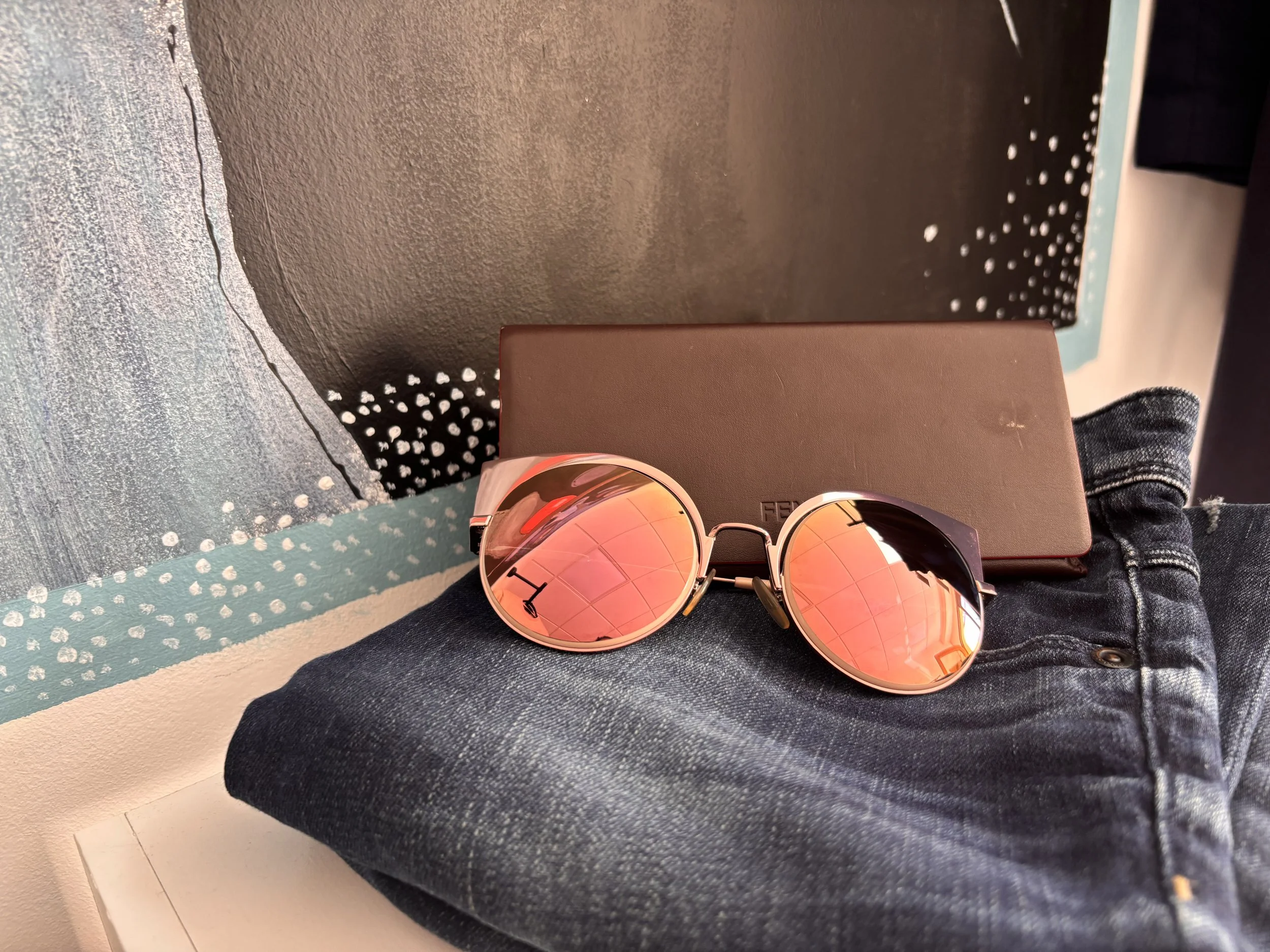 Fendi designer sunglasses with rose gold mirrored lenses and case
