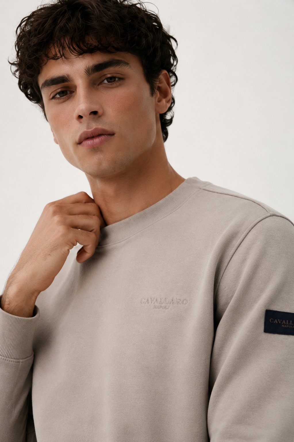 Cavallaro Napoli men’s cream beige premium sweatshirt featuring a minimalist embroidered logo, crew neck design and smart casual luxury styling.