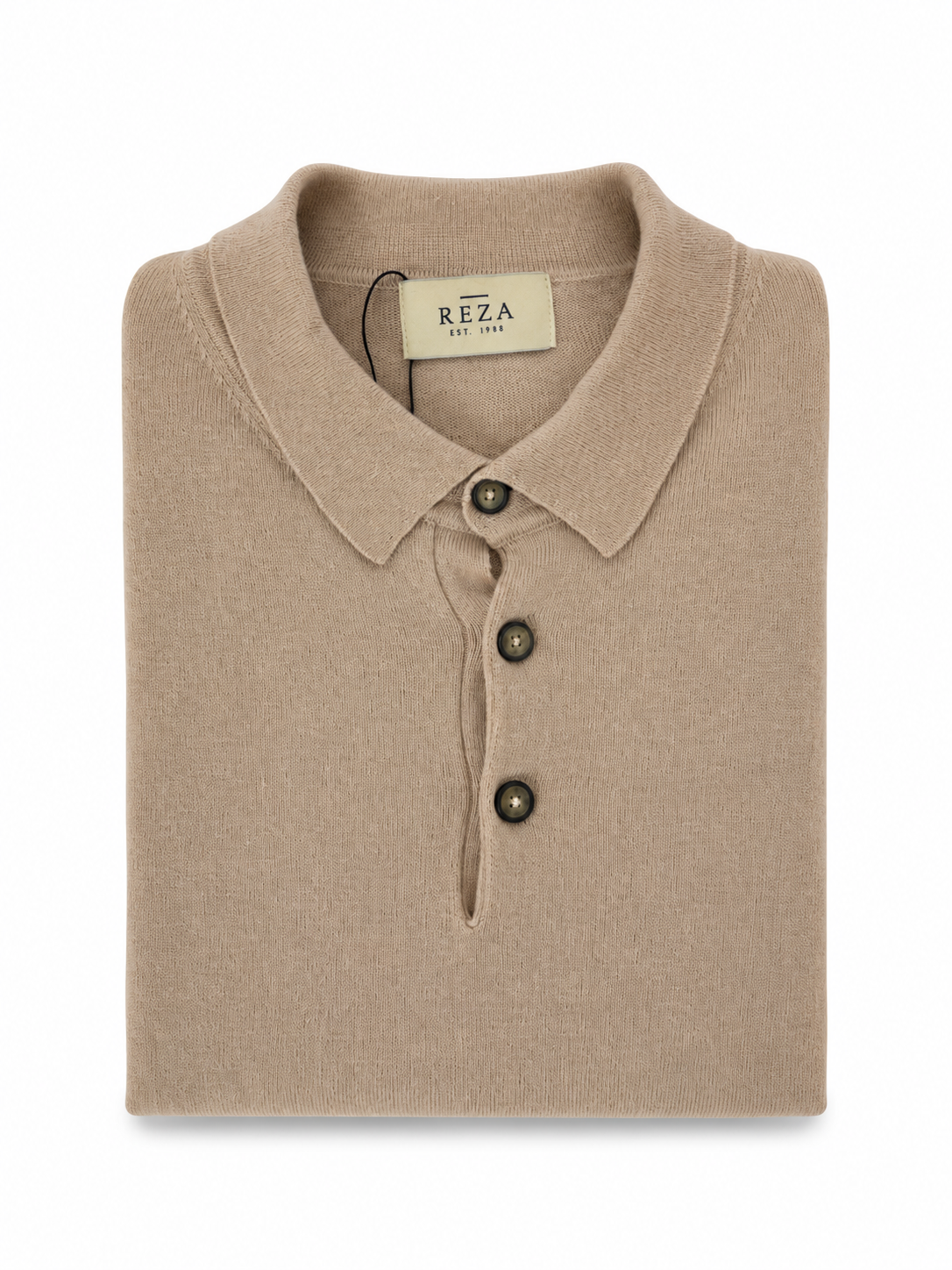 Close-up of the REZA beige knit polo collar with three-button fastening, showcasing the soft cotton cashmere blend and refined detailing