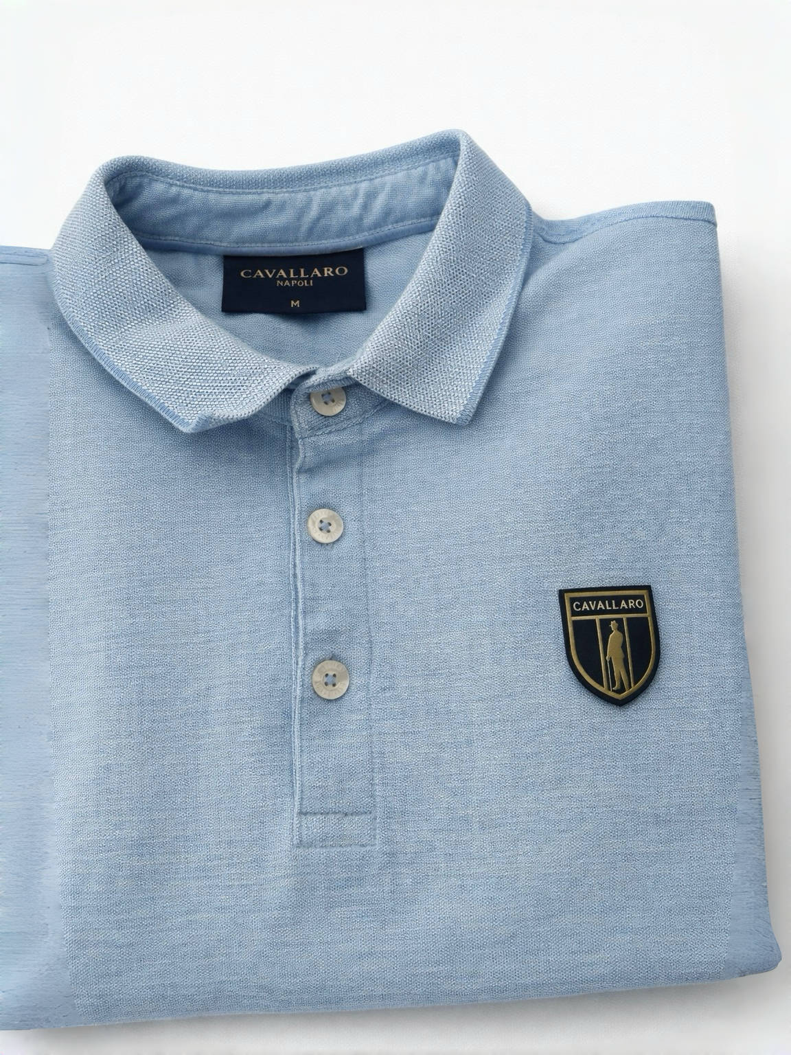 Cavallaro Napoli light blue polo shirt folded front view logo detail premium cotton men polo