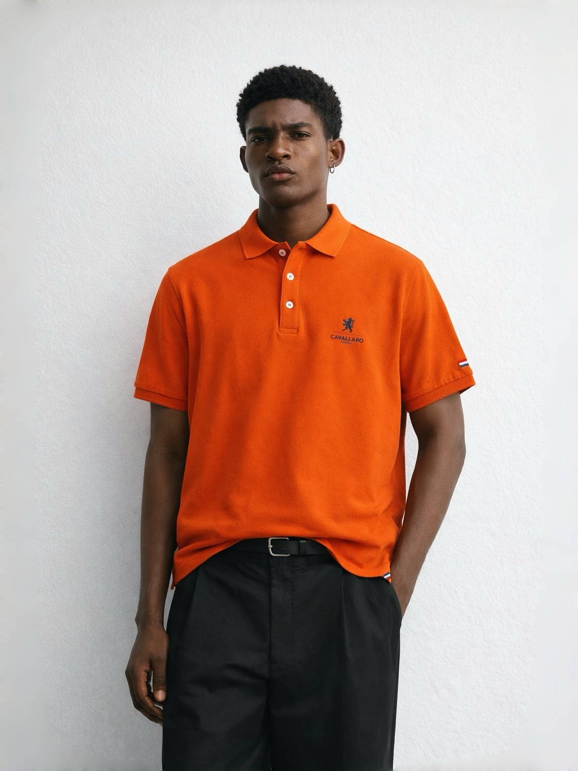 Cavallaro Napoli orange polo shirt men’s designer cotton short sleeve polo worn on model smart casual look