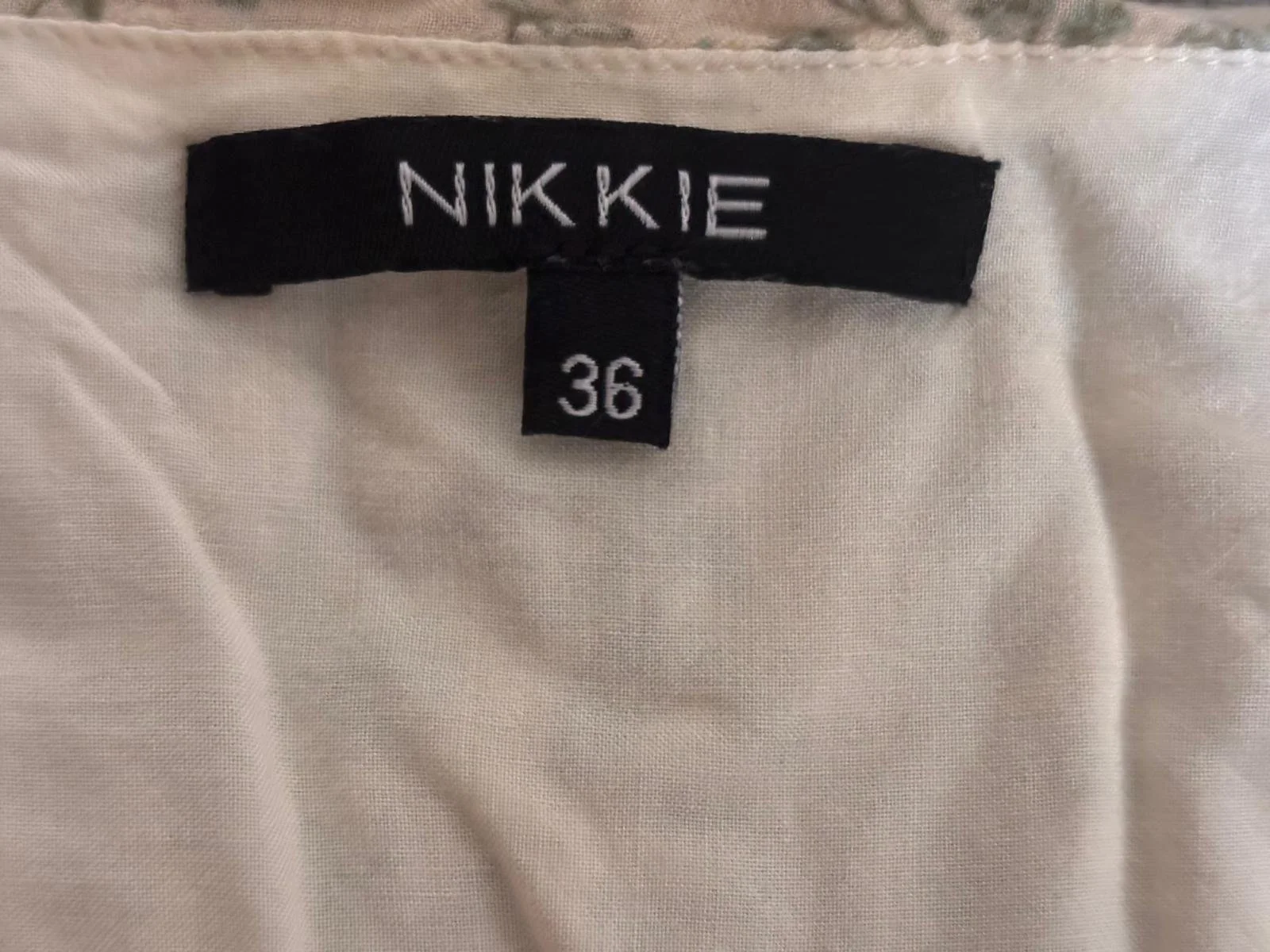 NIKKIE brand label size 36 on floral dress