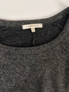 Close-up of Patrizia Pepe dark grey knit sweater neckline and designer label detail