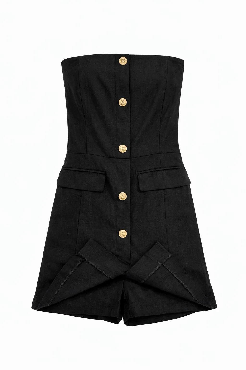 Detail of black NIKKIE shorts jumpsuit hem and fabric texture with tailored construction – pre-owned luxury Norée. Virtual Preview Available