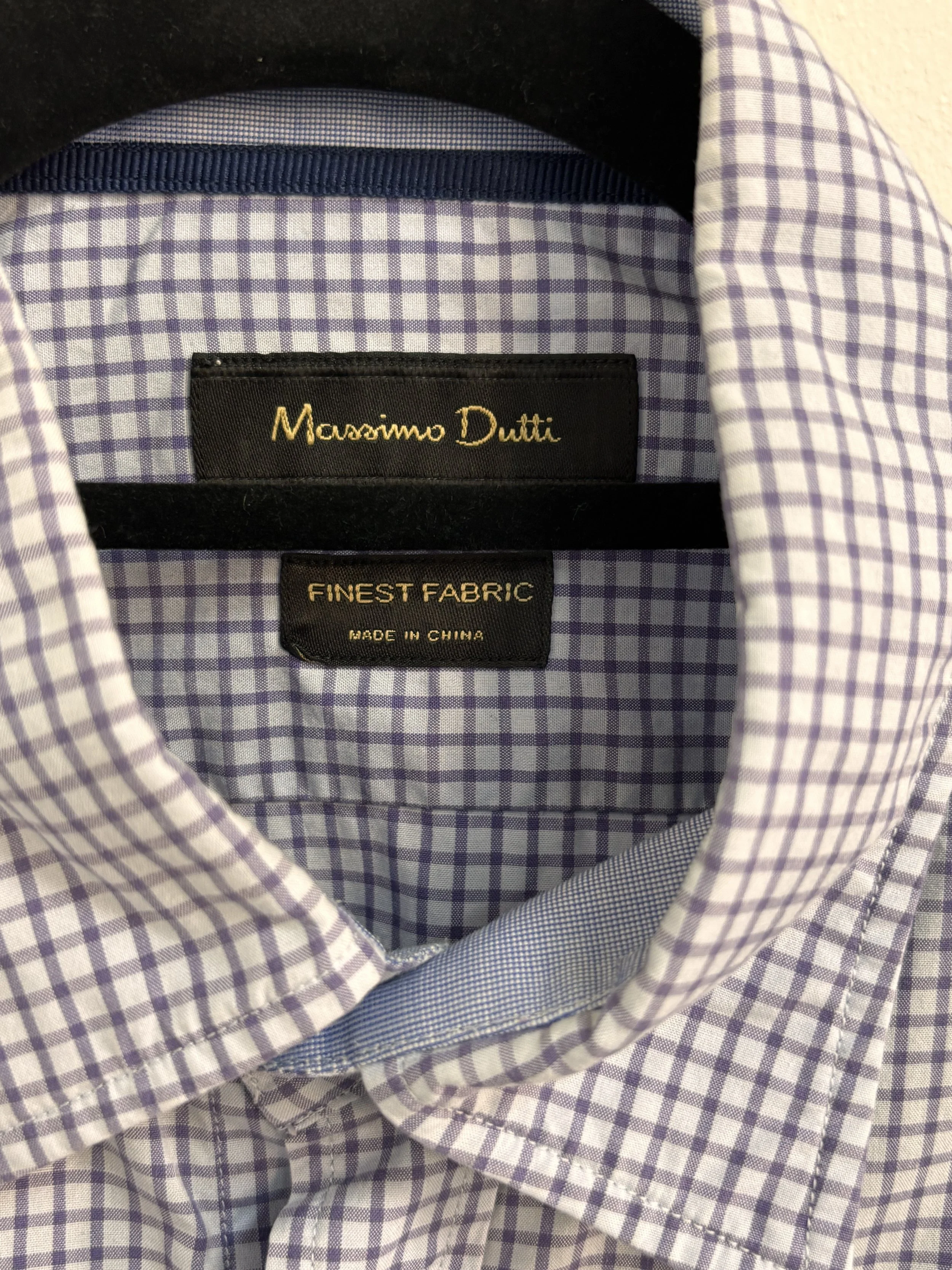 Massimo Dutti Finest Fabric label on blue and white checked men’s shirt collar