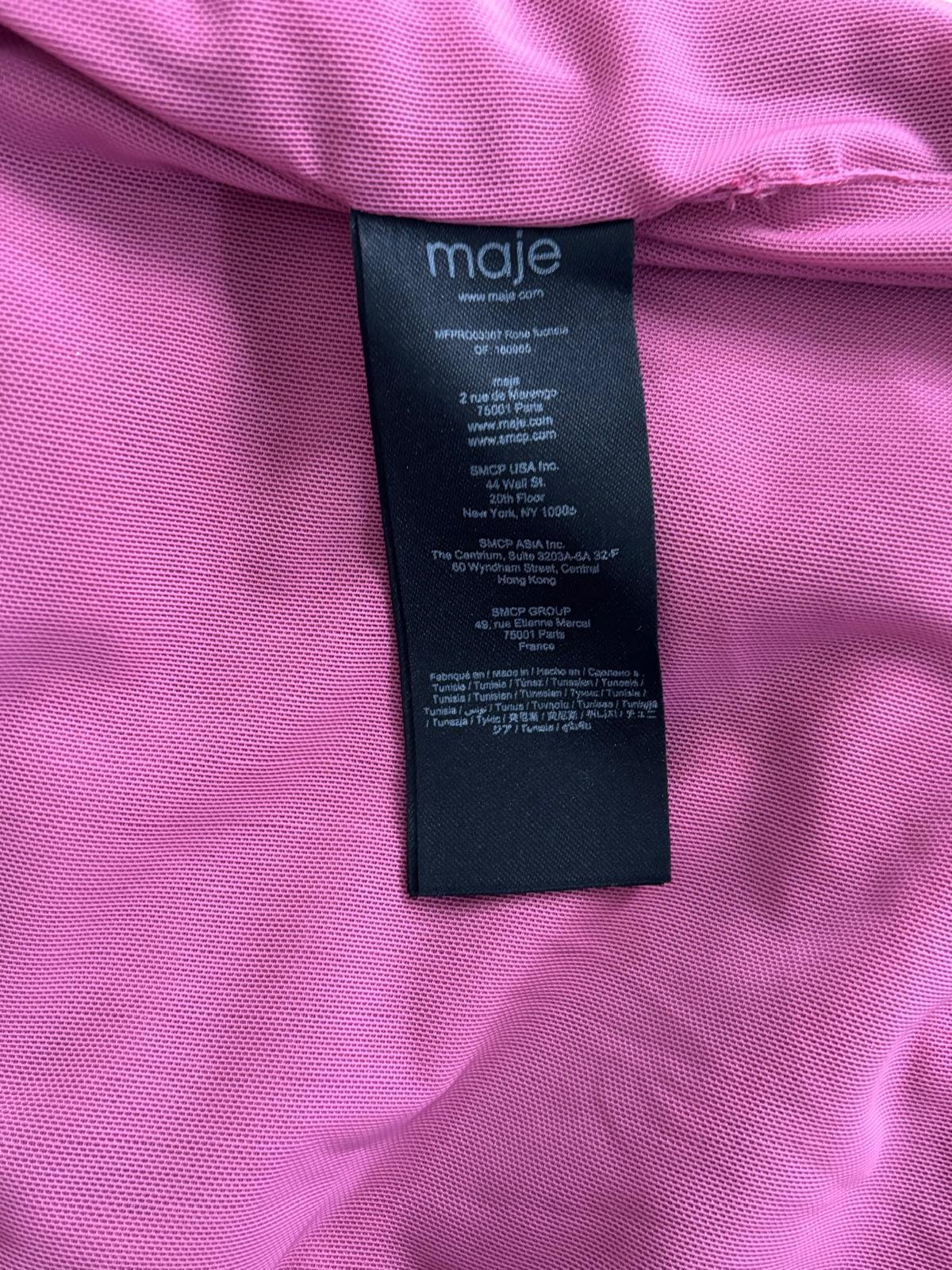 Maje brand label and size tag detail on pink women’s designer dress, authentic pre-loved garment.
