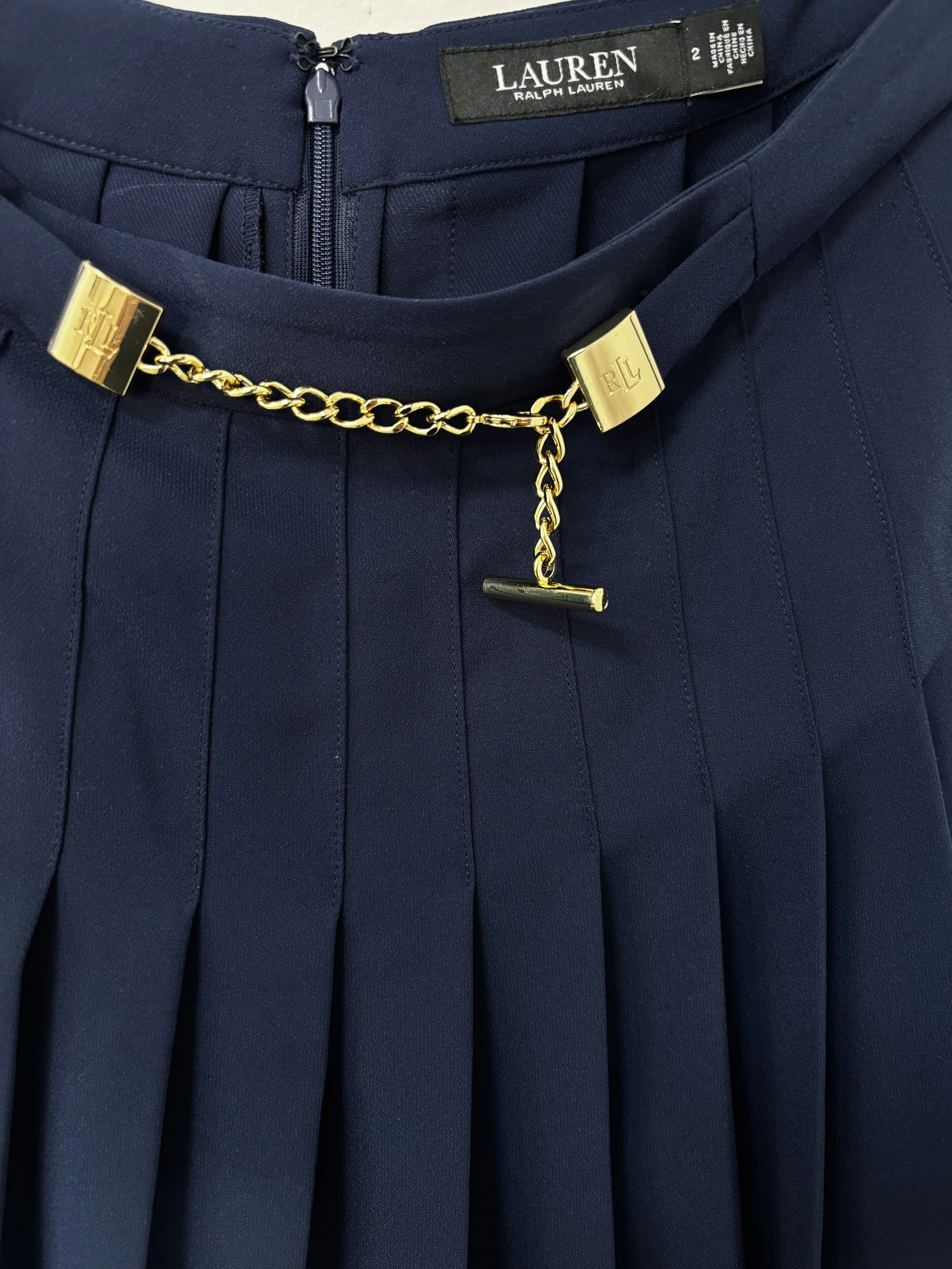 Lauren Ralph Lauren navy pleated skirt with gold-tone RL chain detail