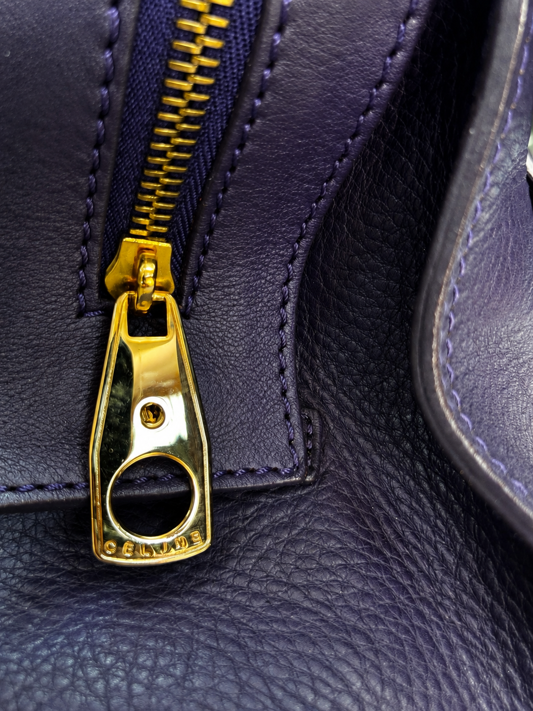 Celine gold-tone branded zipper detail