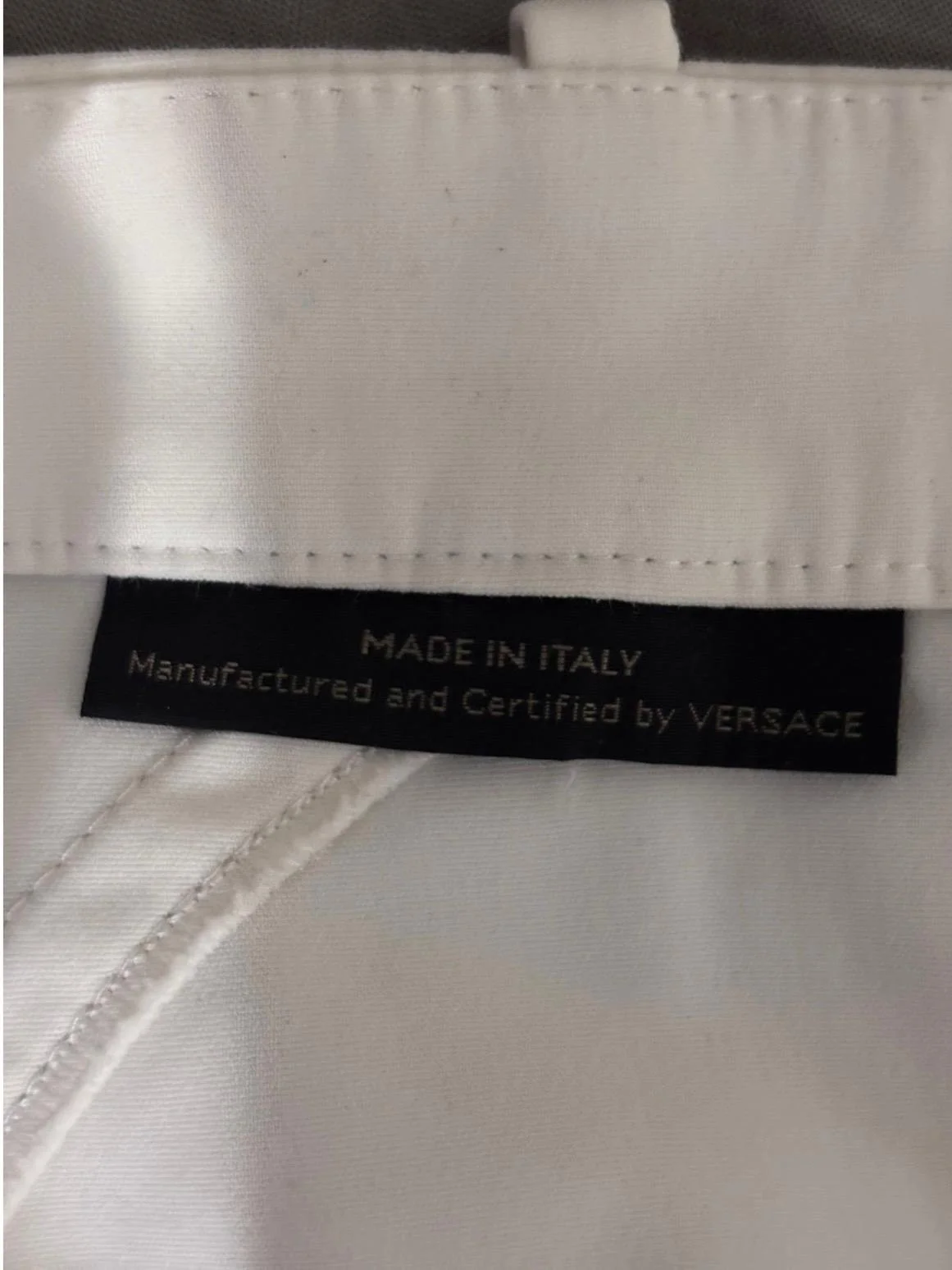 Gianni Versace trousers interior label Made in Italy authentic designer tag detail