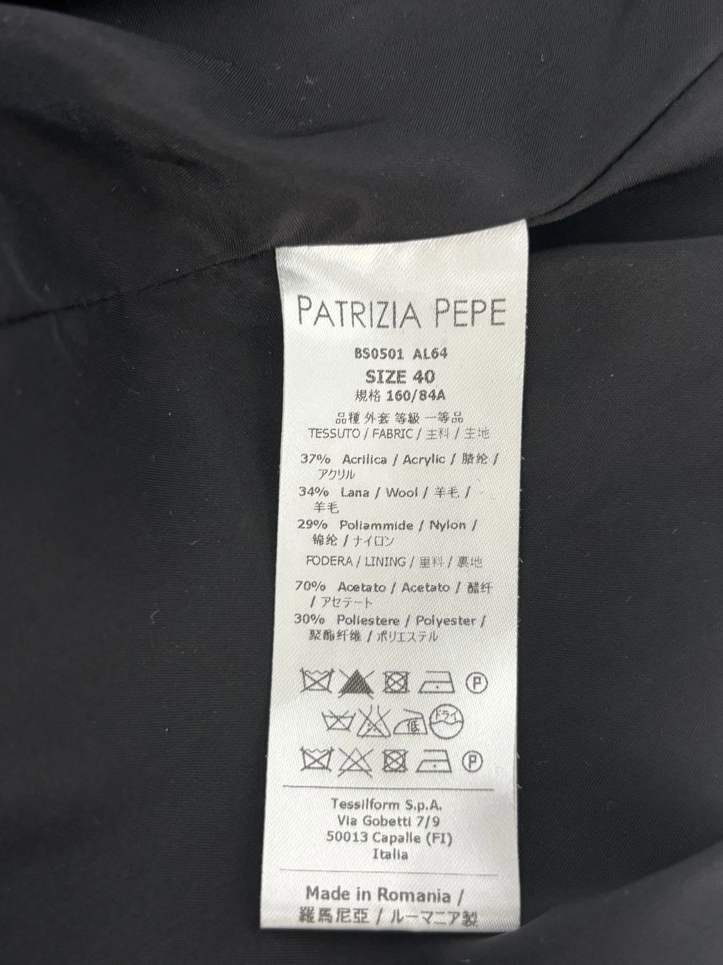 Original Patrizia Pepe designer blazer care label showing size 40, 37% acrylic, 34% wool, 29% nylon, acetate-blend lining and manufacture in Romania.