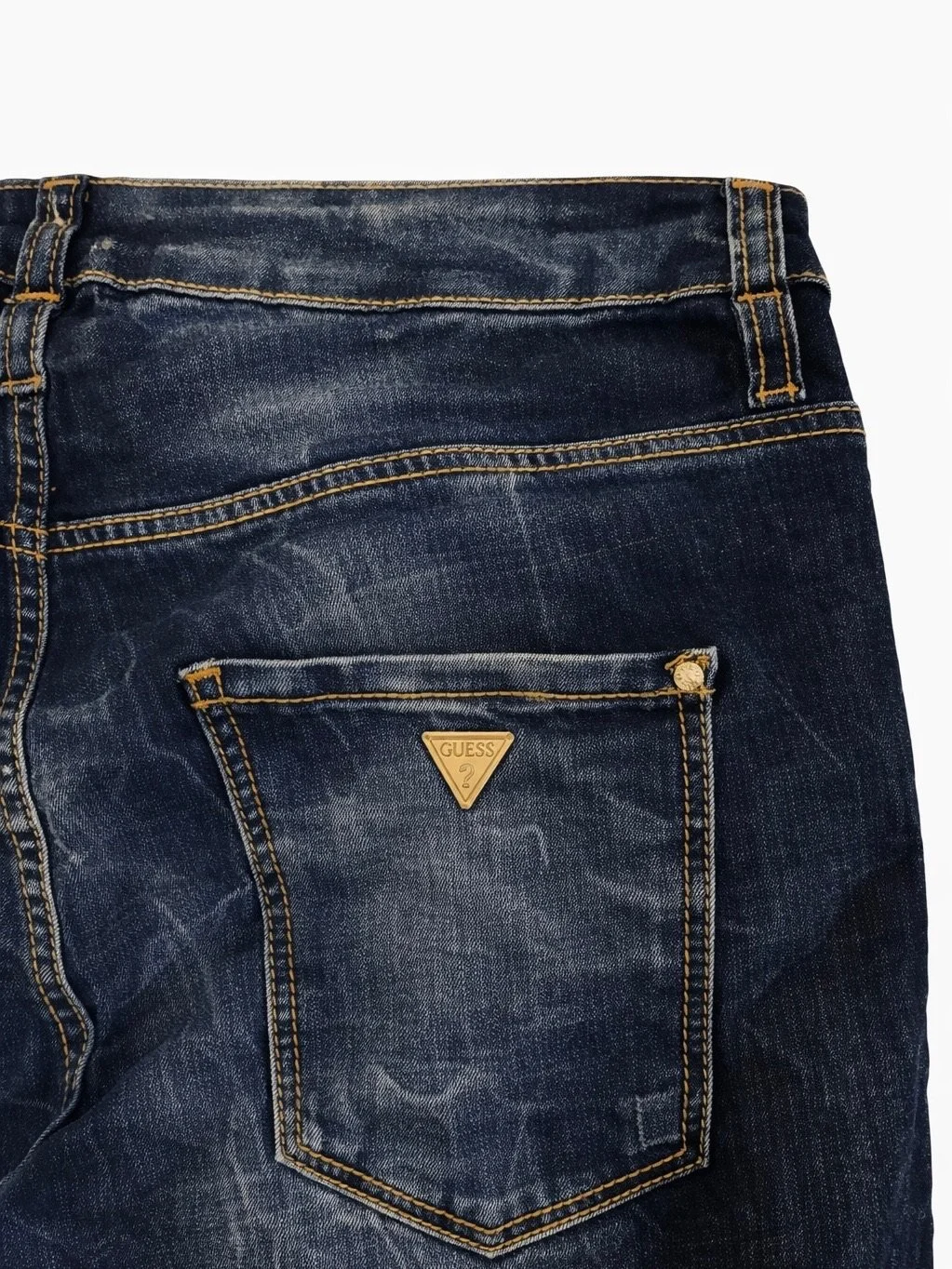 Guess triangle logo pocket detail on distressed blue denim Skinny Boyfriend jeans
