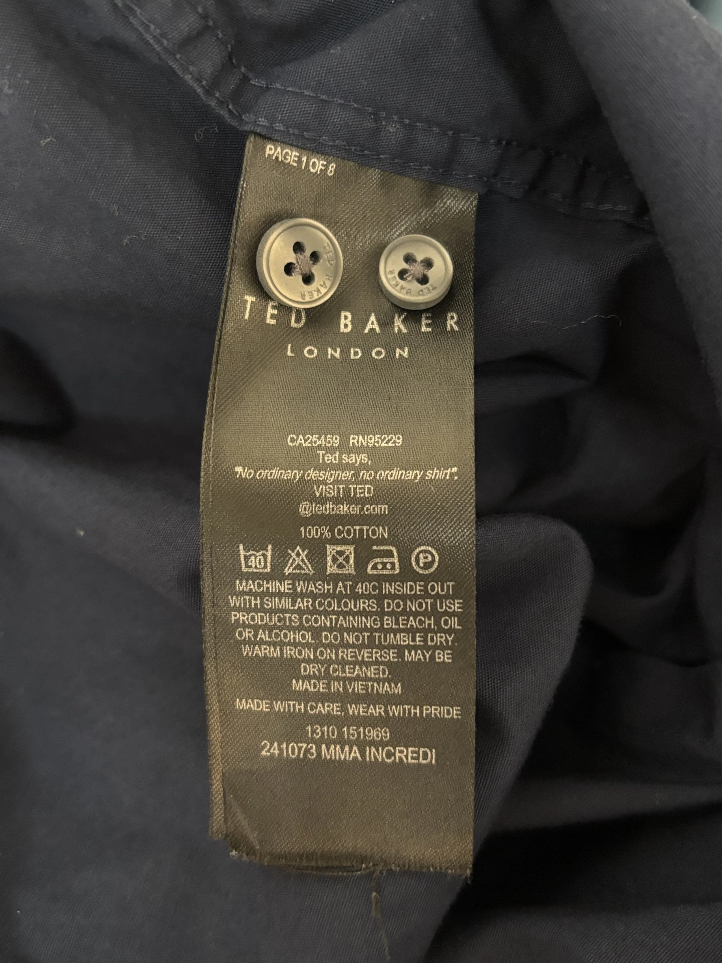 Ted Baker London garment label detail showing 100% cotton composition and premium designer shirt construction