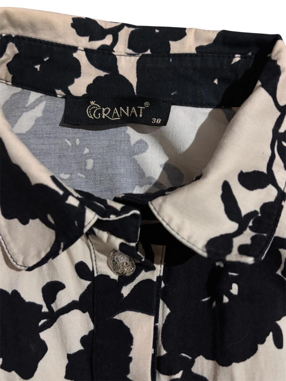 Granat Collection black floral print detail, label front view